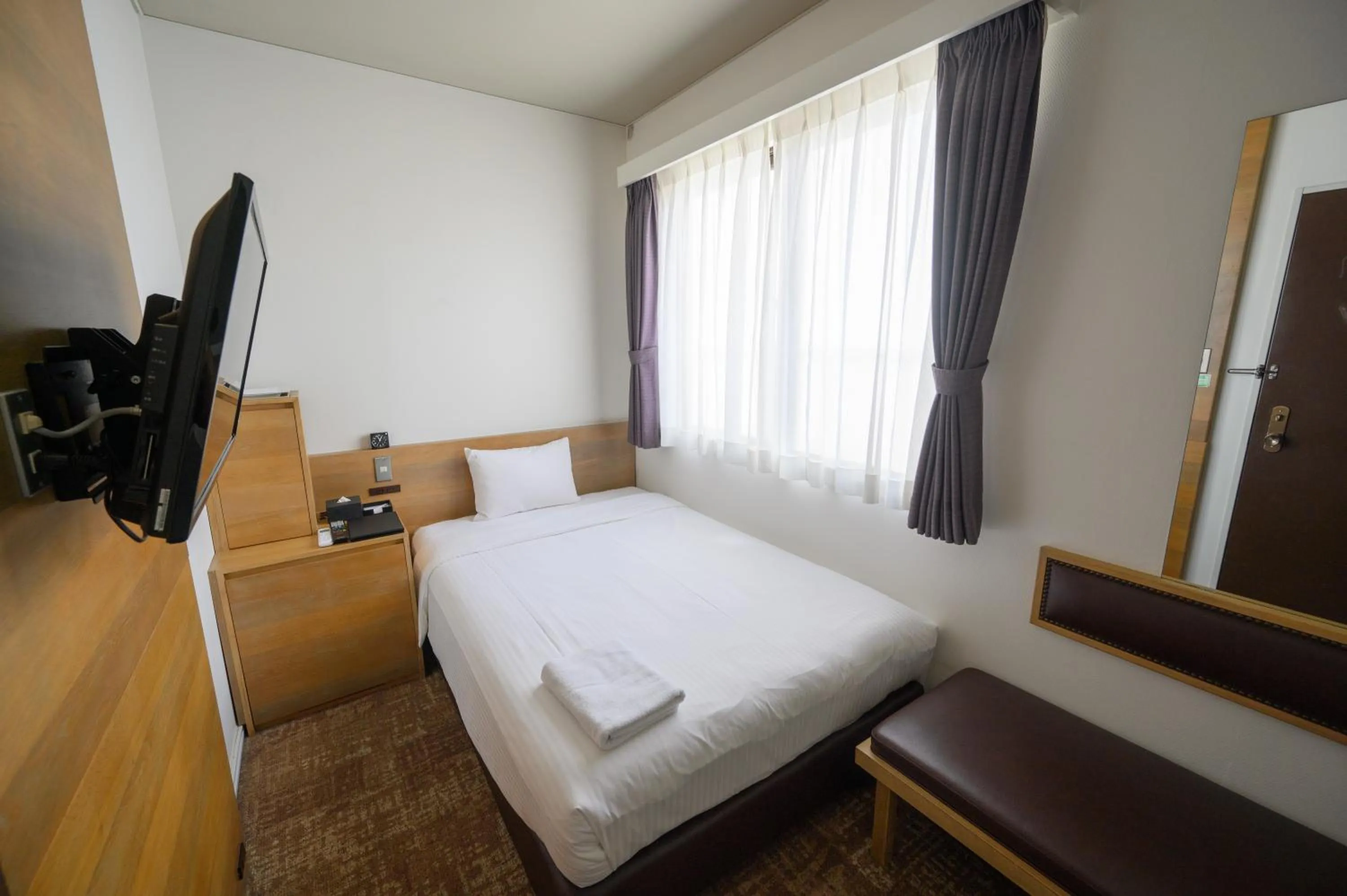 Photo of the whole room, Bed in Hotel Emerald Isle Ishigakijima