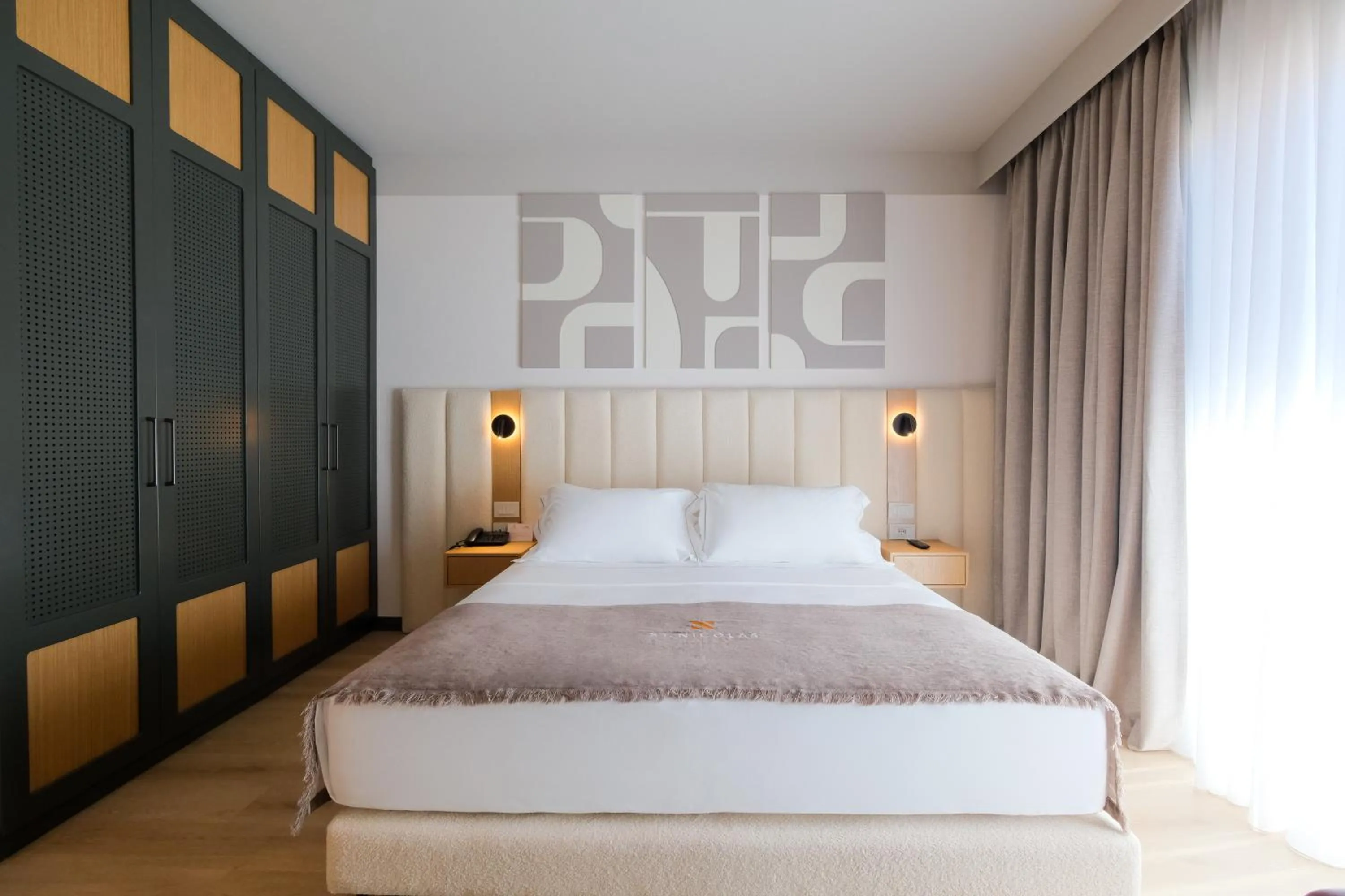 Bed in Saint Nicolas Hotel