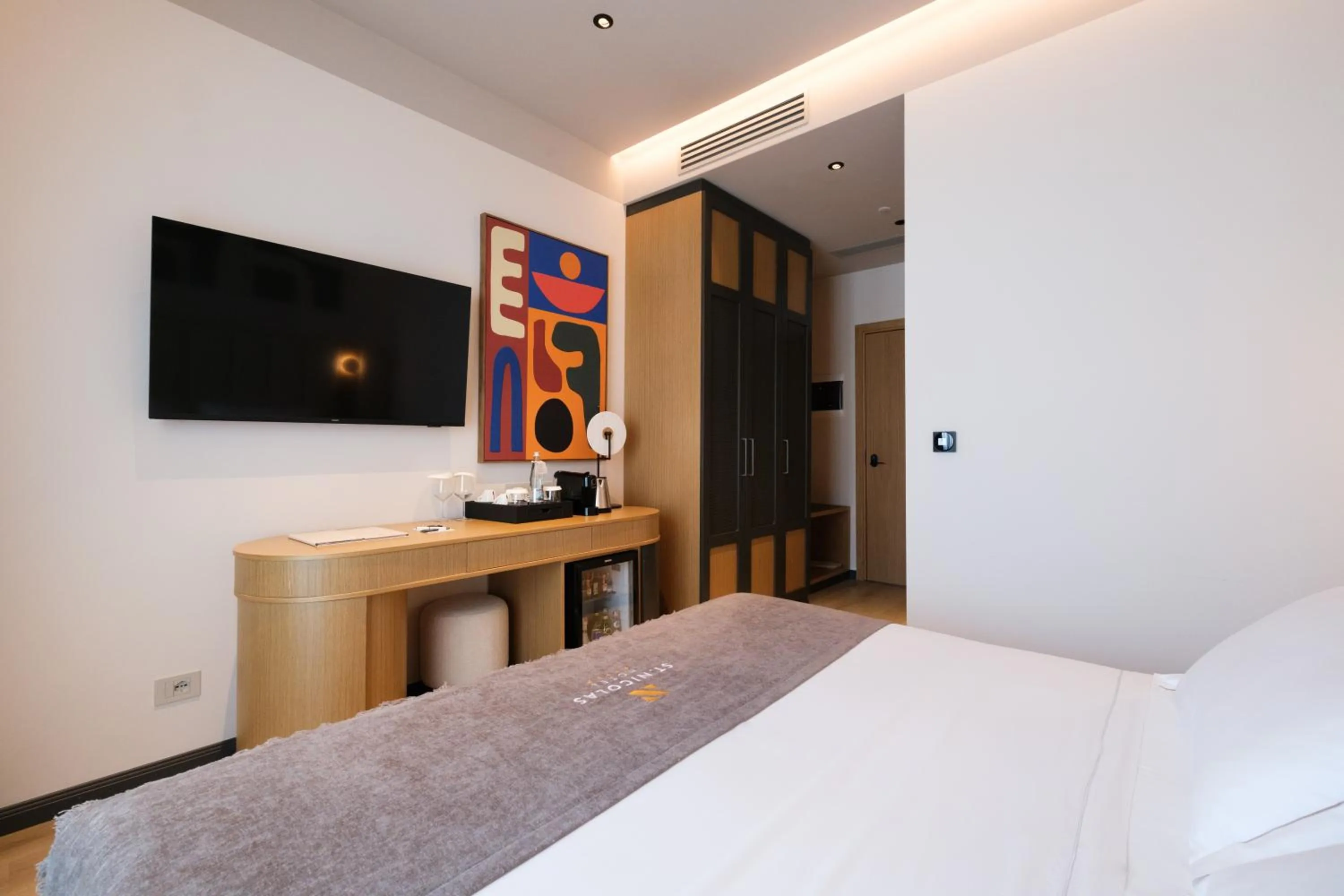 Bed in Saint Nicolas Hotel