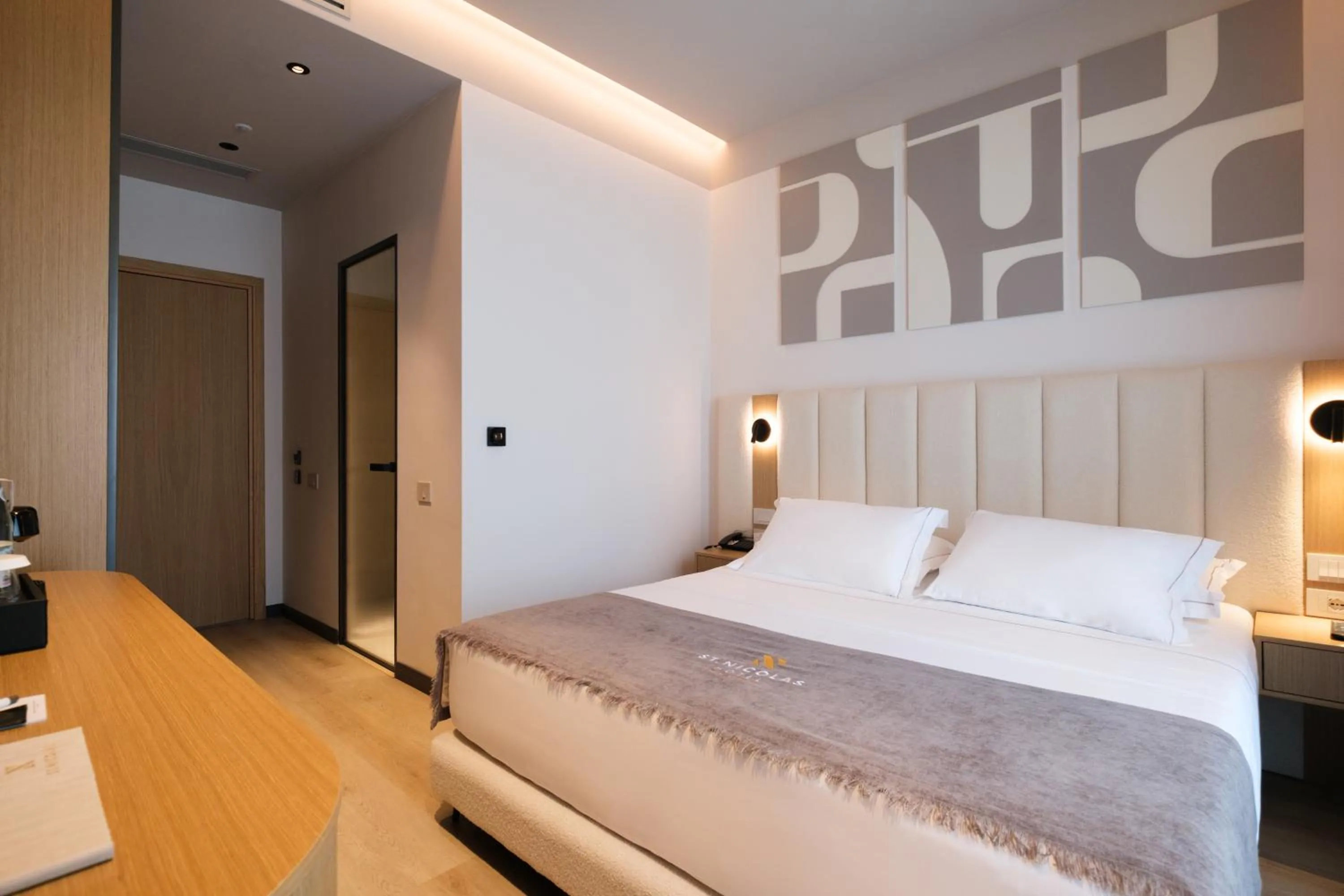 Bed in Saint Nicolas Hotel