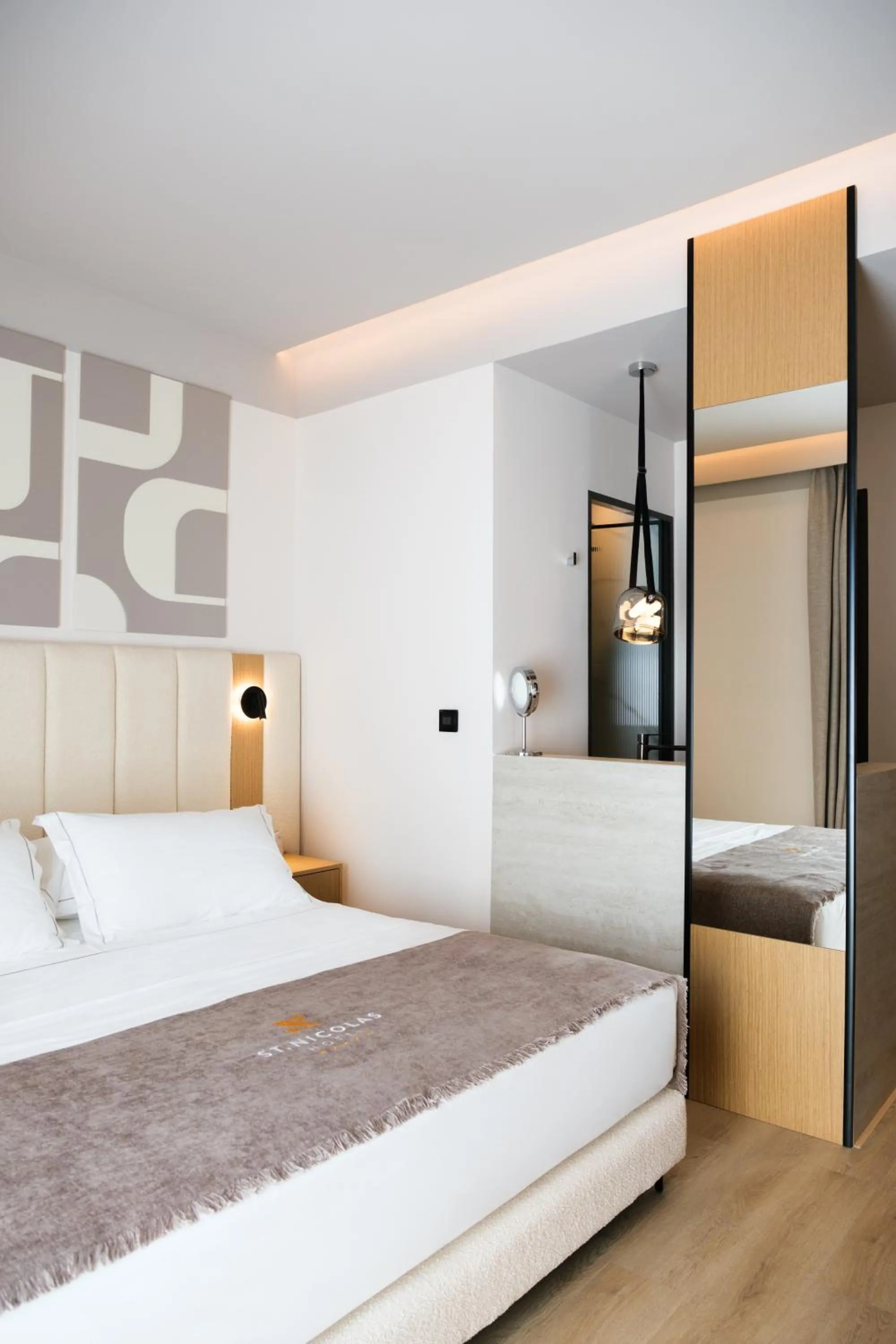 Bed in Saint Nicolas Hotel