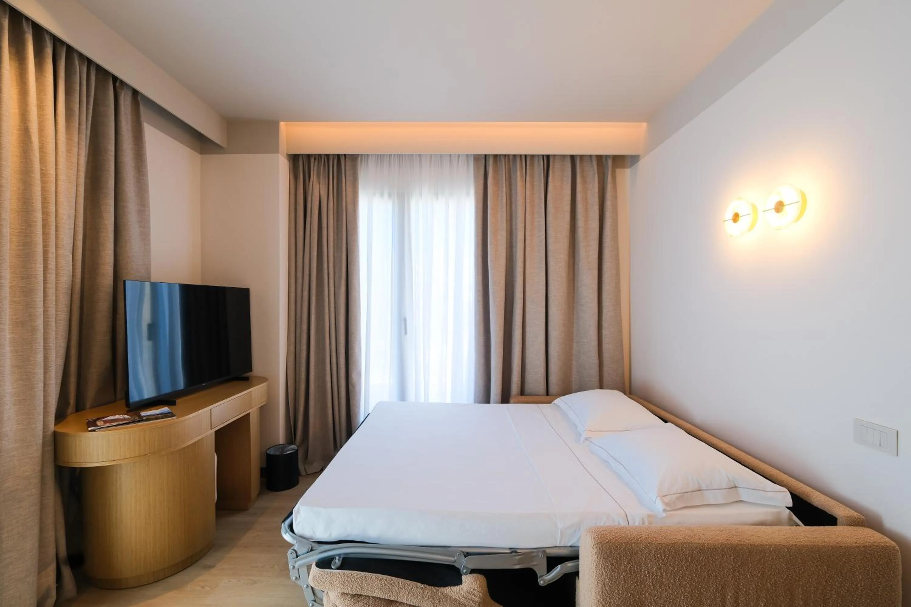 Bed in Saint Nicolas Hotel