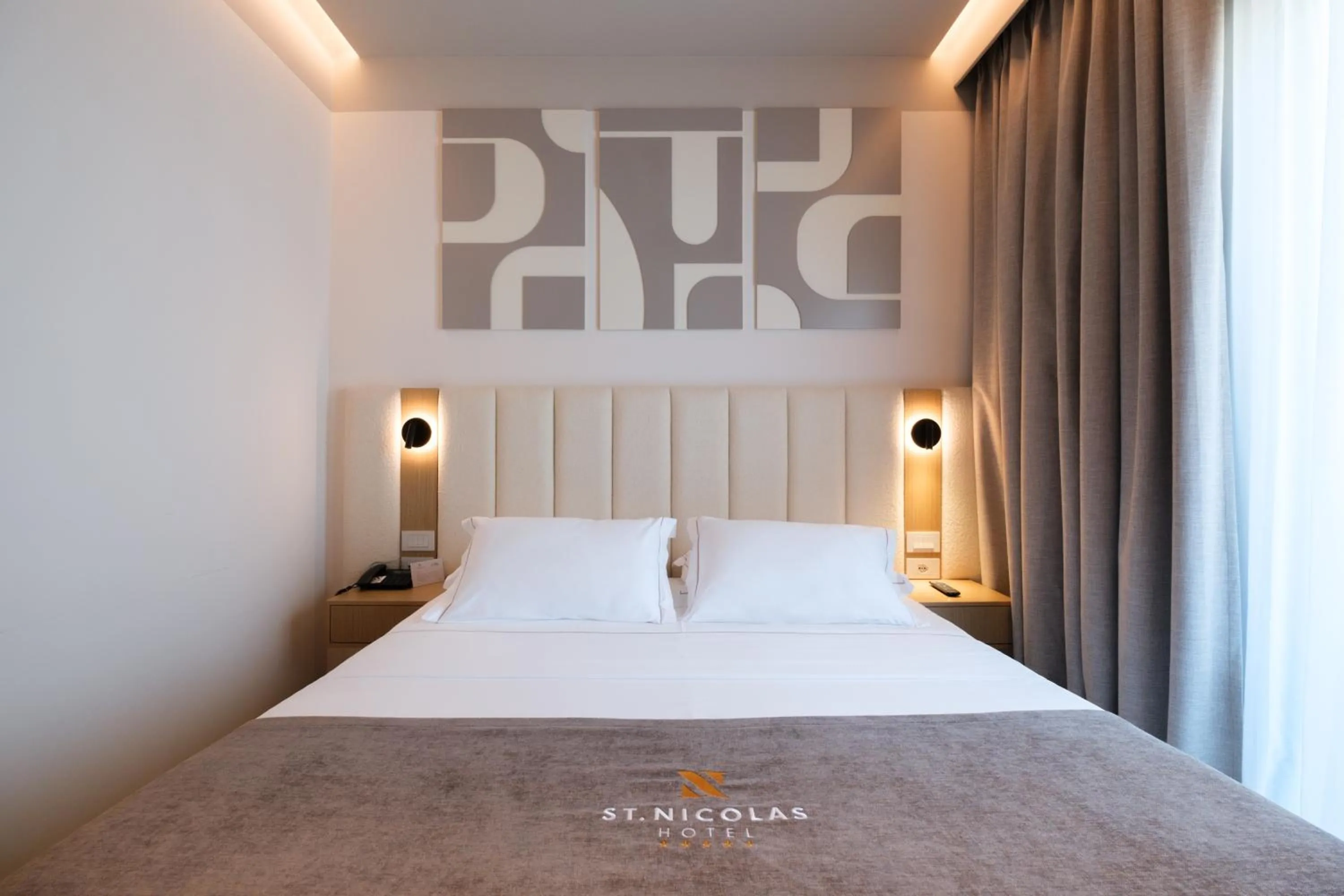 Bed in Saint Nicolas Hotel