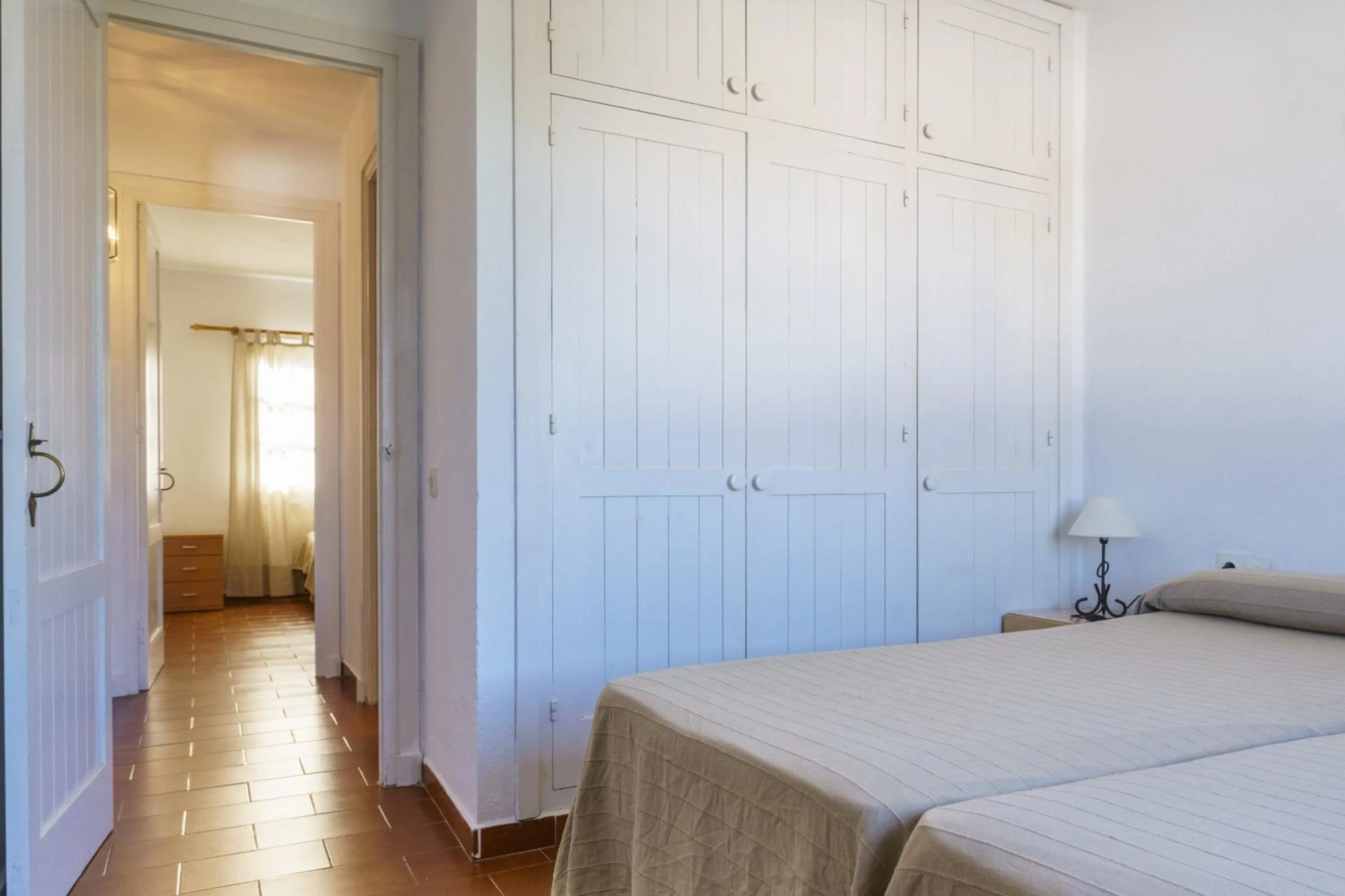 Bed in Apartamentos Posidonia