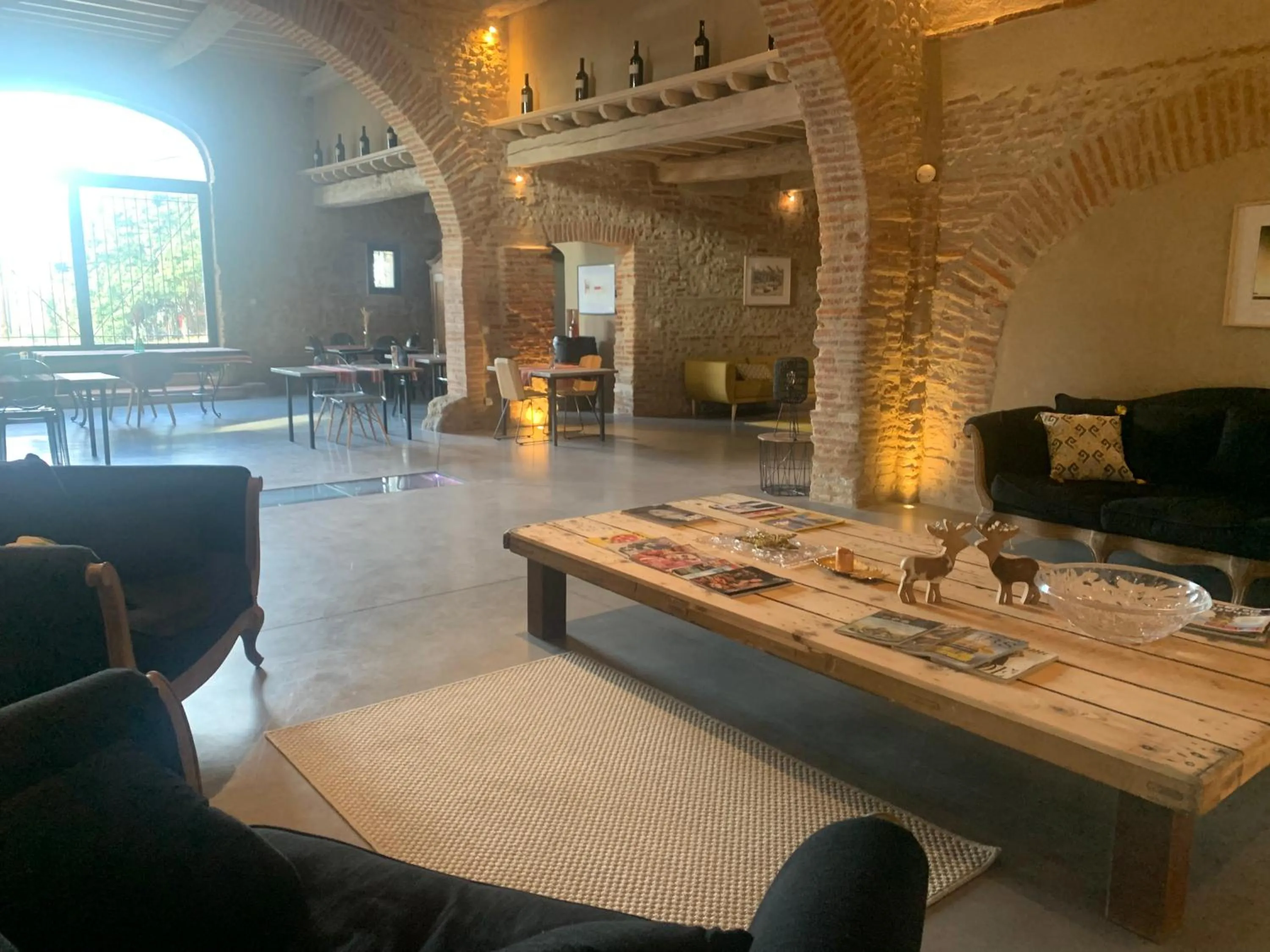 Communal lounge/ TV room in Mas Latour Lavail