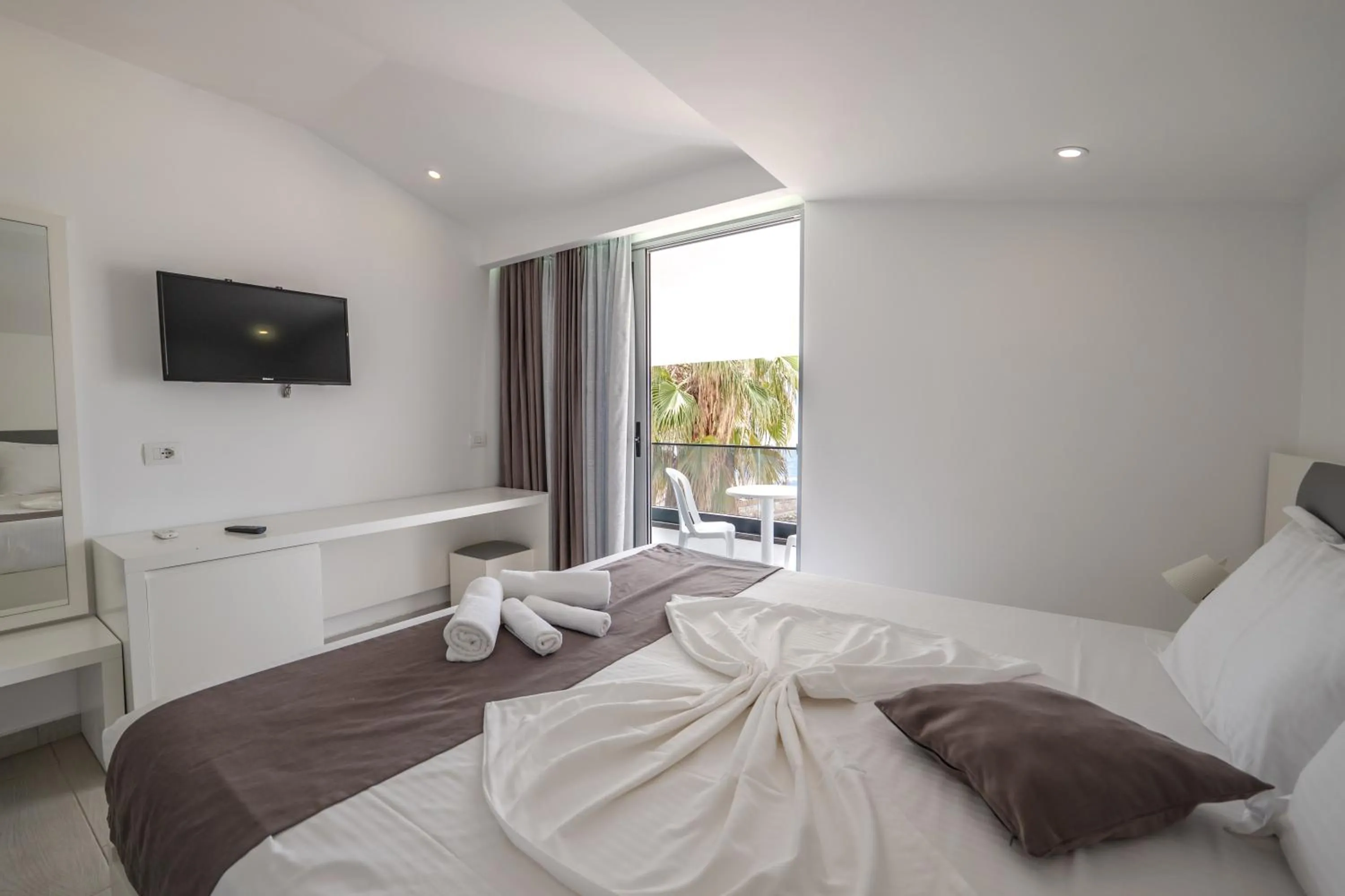 Communal lounge/ TV room, Bed in Vila Era Beach