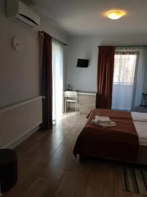 Bed in Sunny Family Vila Constanta