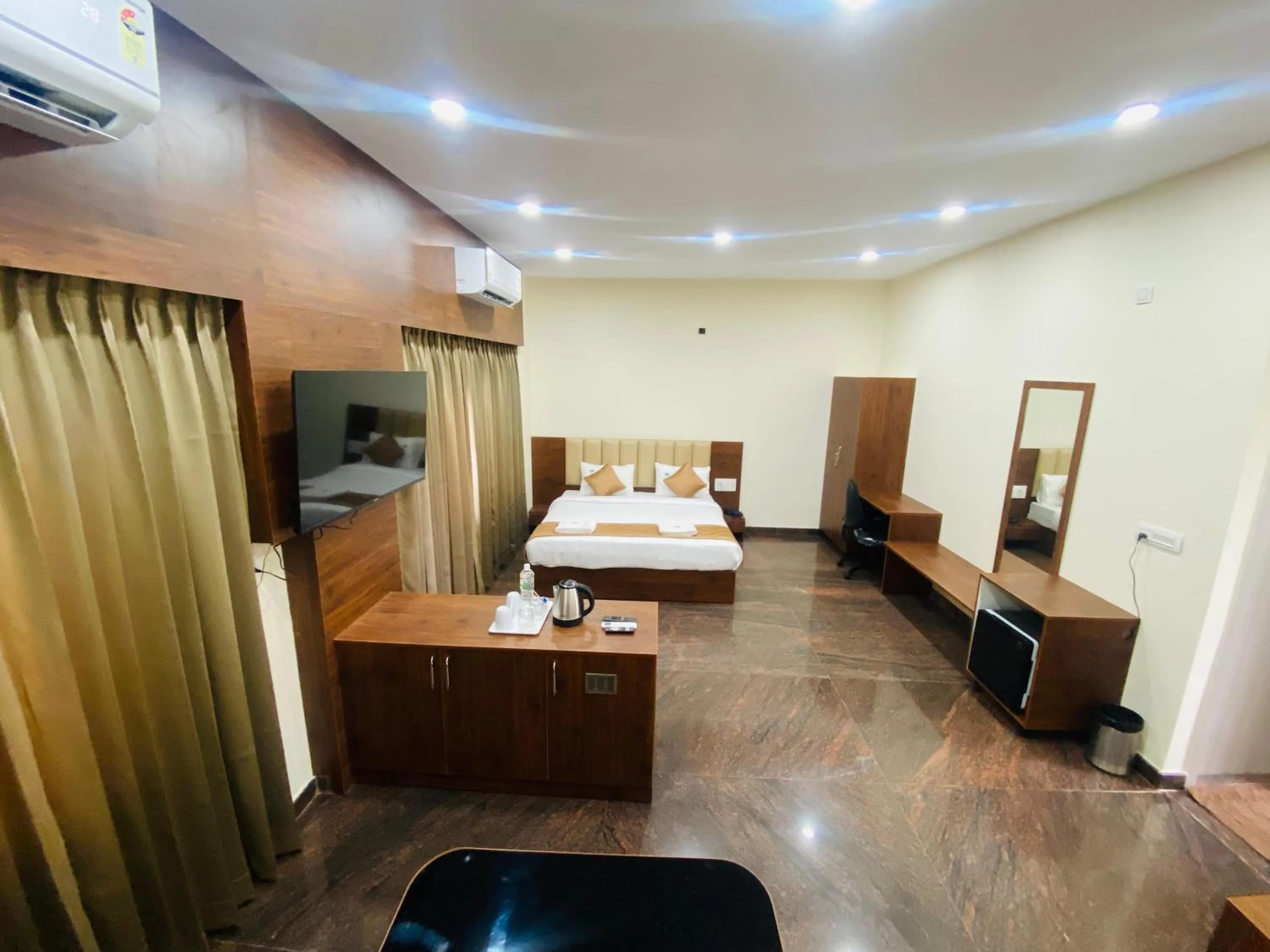 Bed in Hotel Sahara Tree