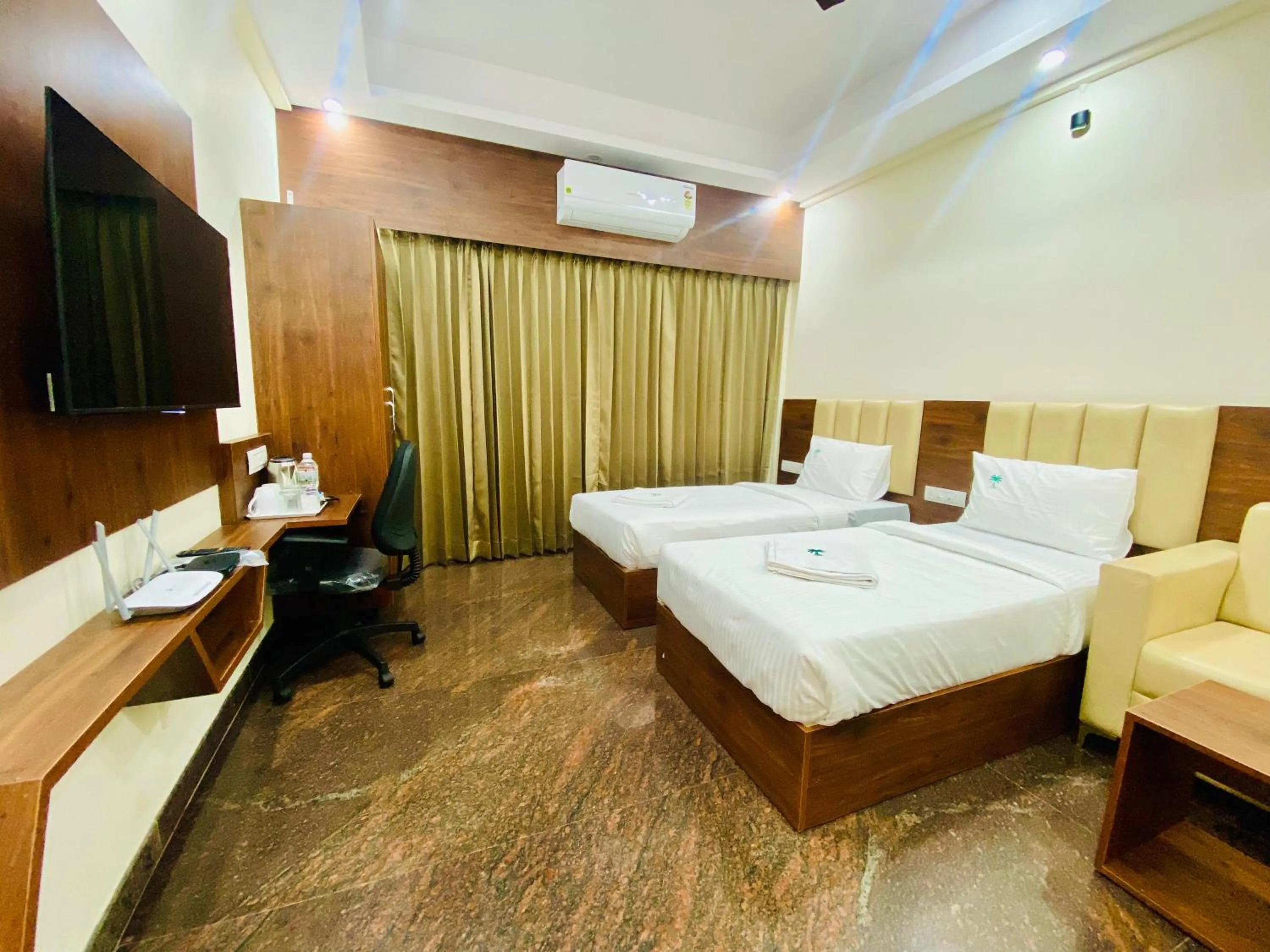 Bed in Hotel Sahara Tree