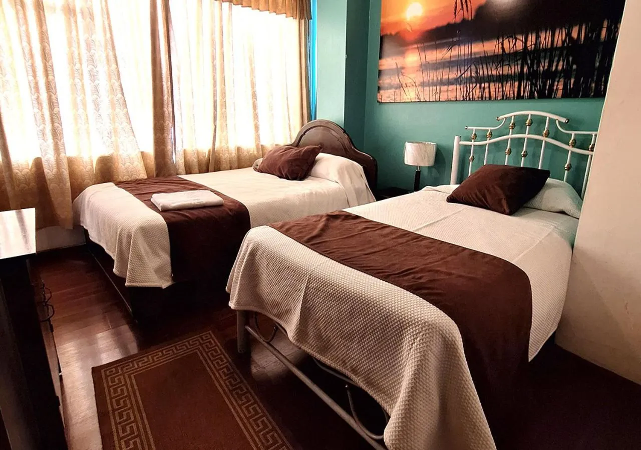 Property building, Bed in La Merced Plaza Hospedaje