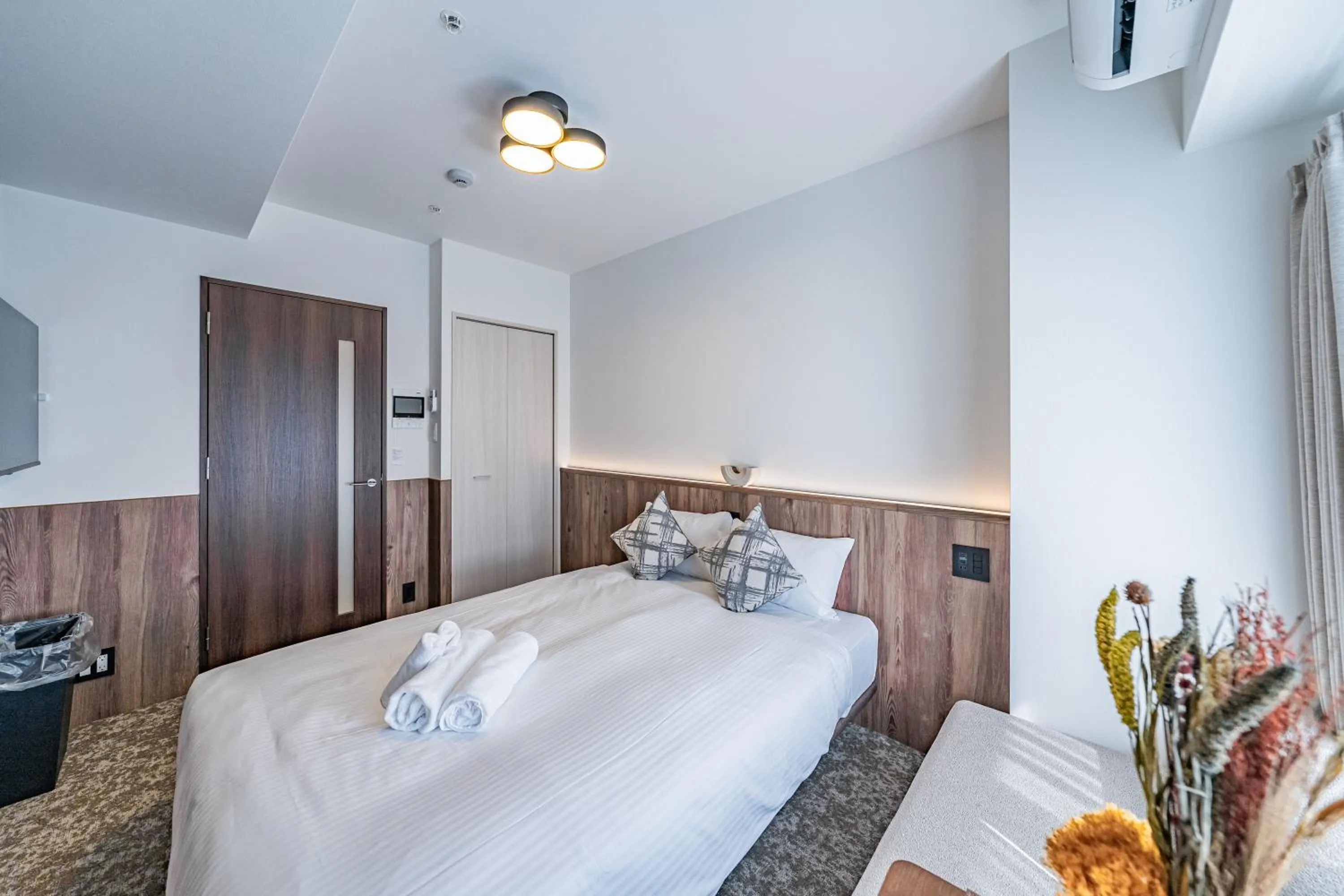 Bed in Apartment Hotel 11 Osaka Dome