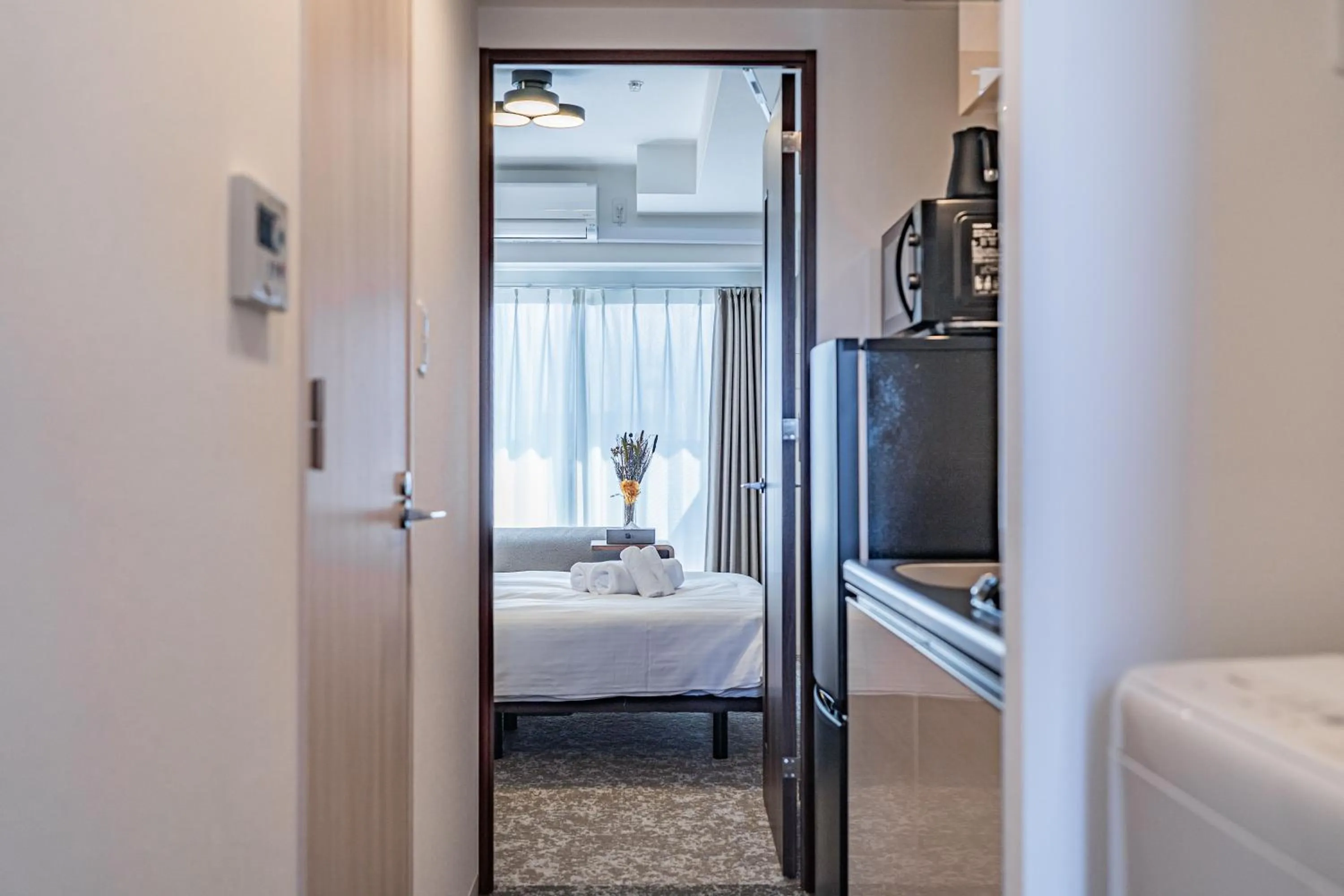 Bed in Apartment Hotel 11 Osaka Dome