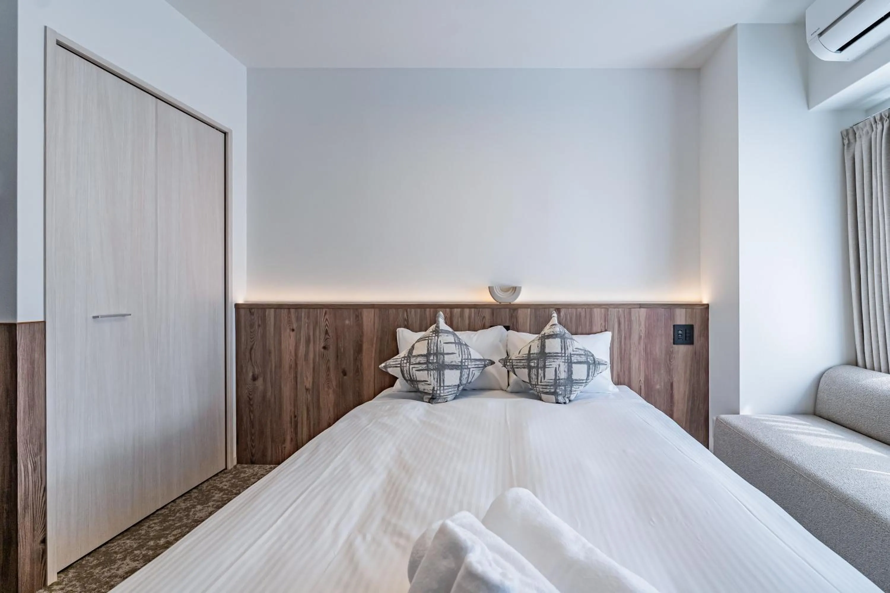 Bed in Apartment Hotel 11 Osaka Dome