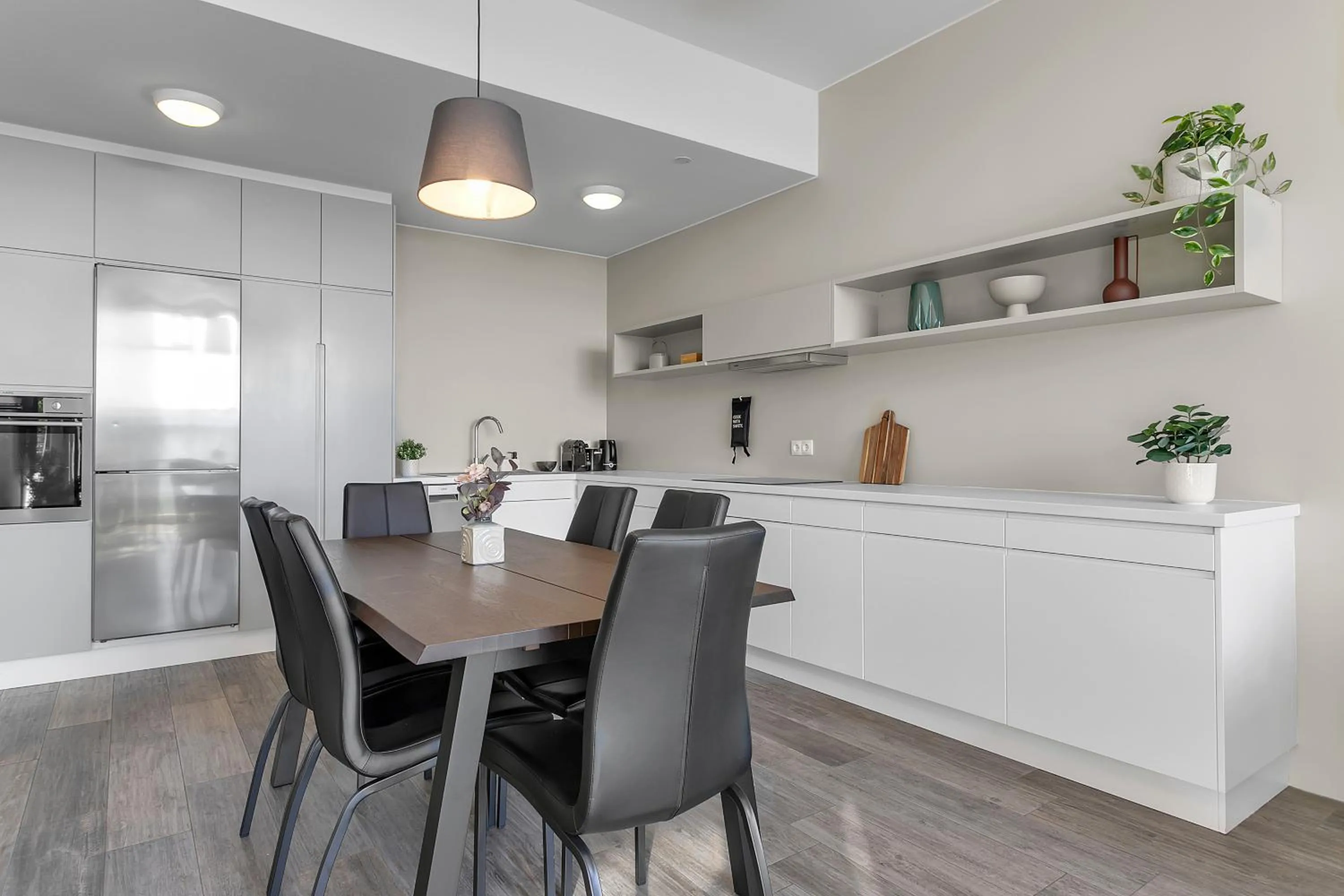 Kitchen or kitchenette in Bella Apartments & Rooms