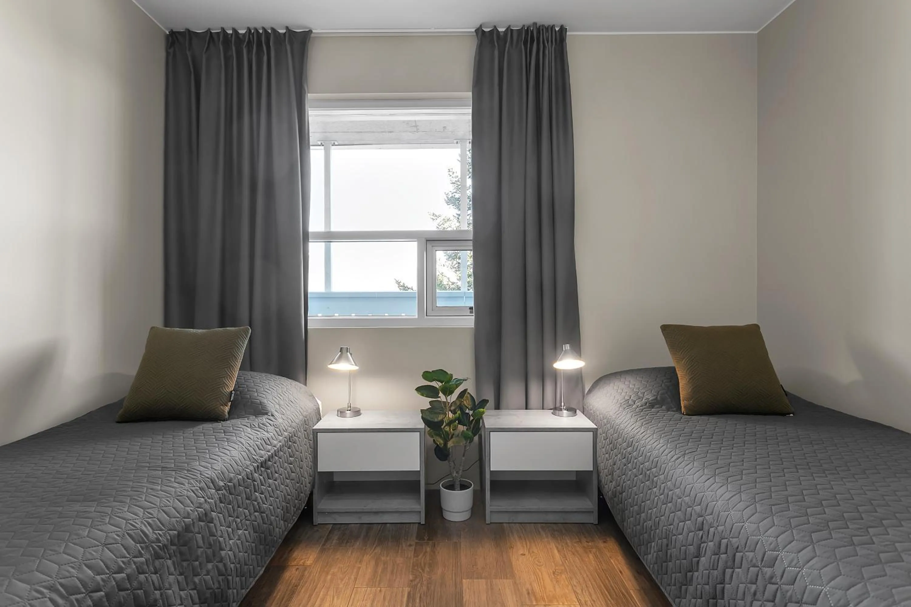 Bed in Bella Apartments & Rooms