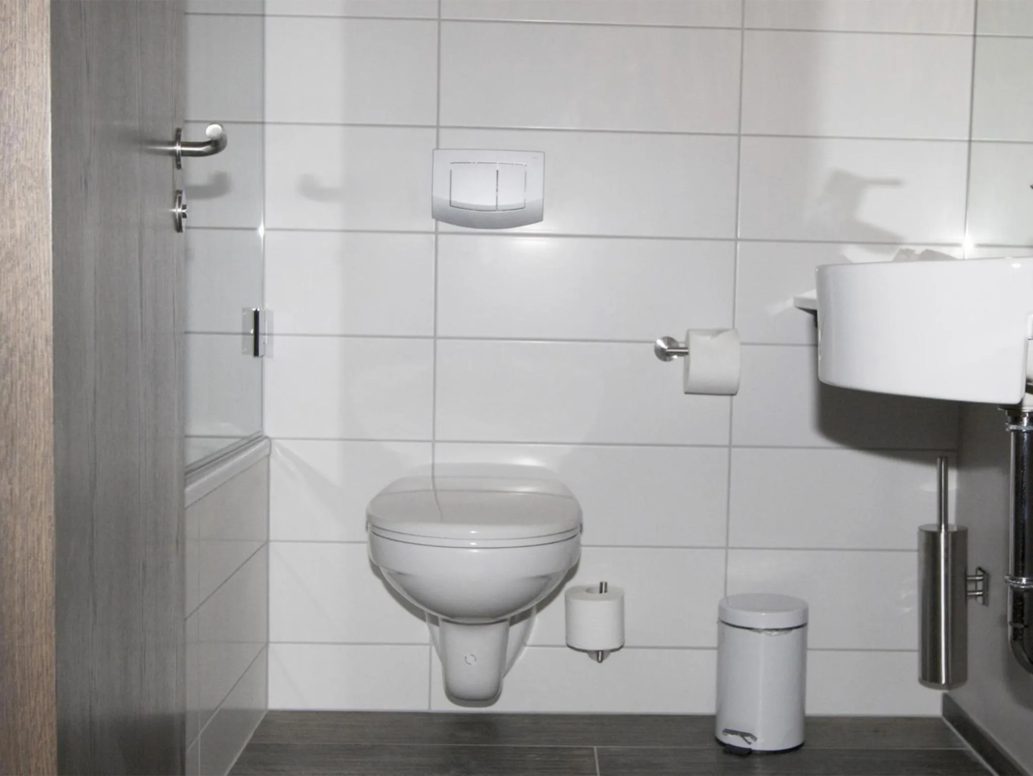 Bathroom in Bella Apartments & Rooms