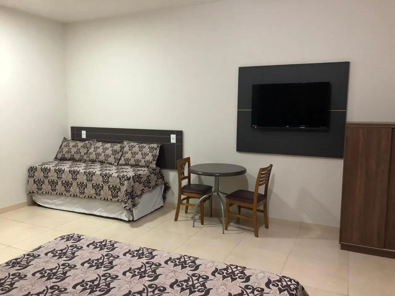 Photo of the whole room, Bed in Victor Plaza Formiga