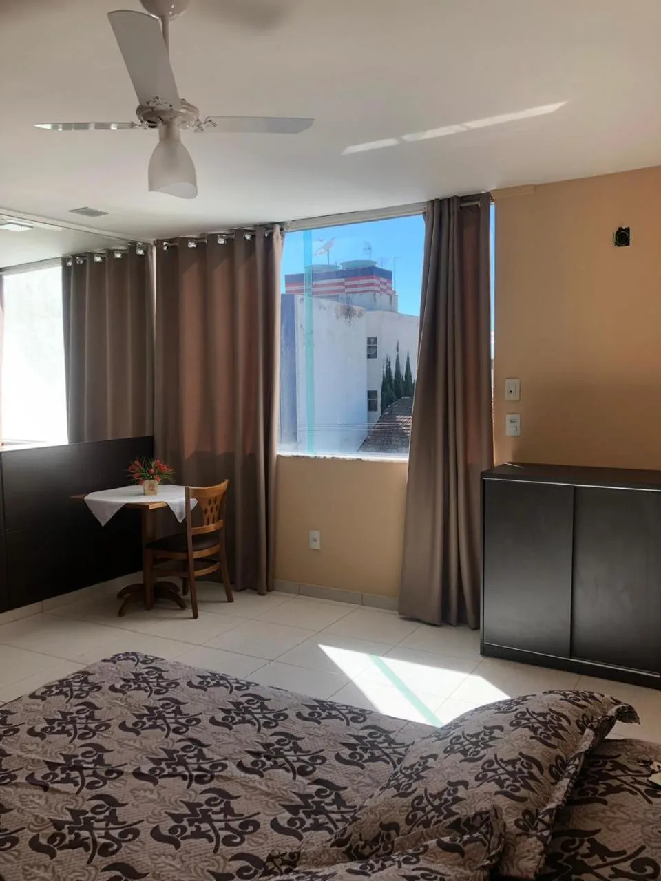 Living room, Bed in Victor Plaza Formiga