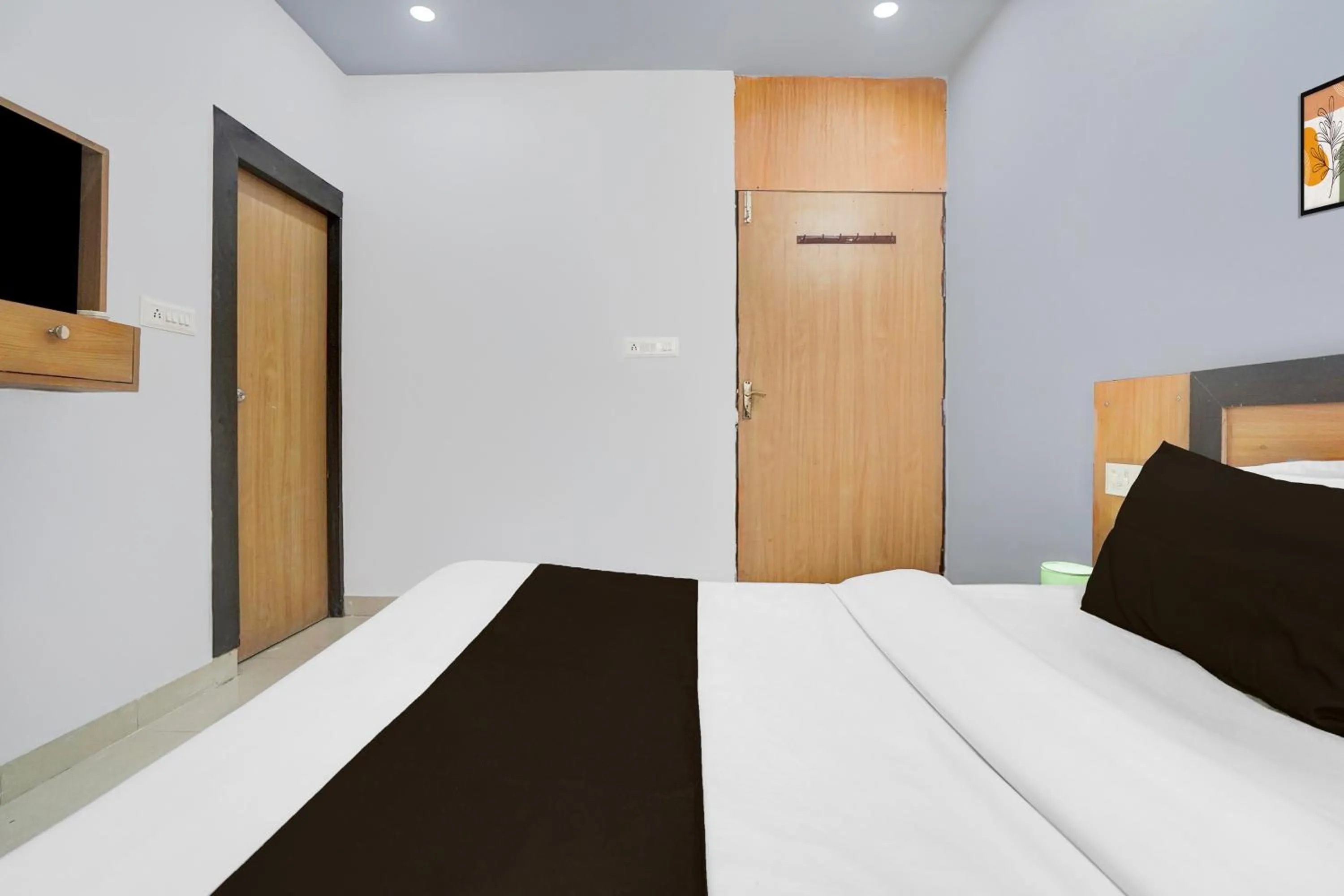Bedroom, Bed in Super Hotel O Gomti Nagar Near Amity Formerly Hotel Green Apple