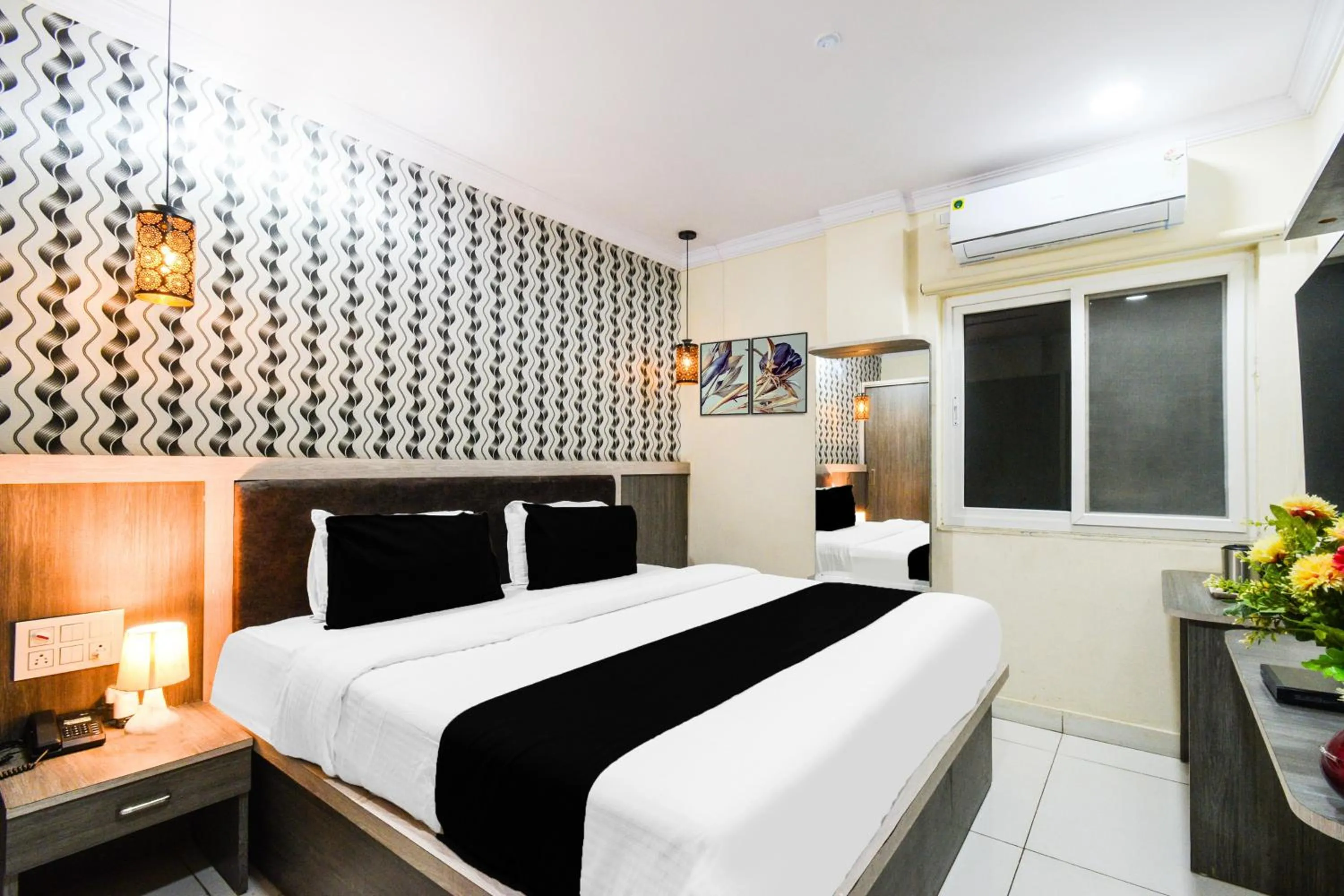 Bedroom, Bed in Super Townhouse Shamshabad Paradise Formerly Blue Petals Hotel