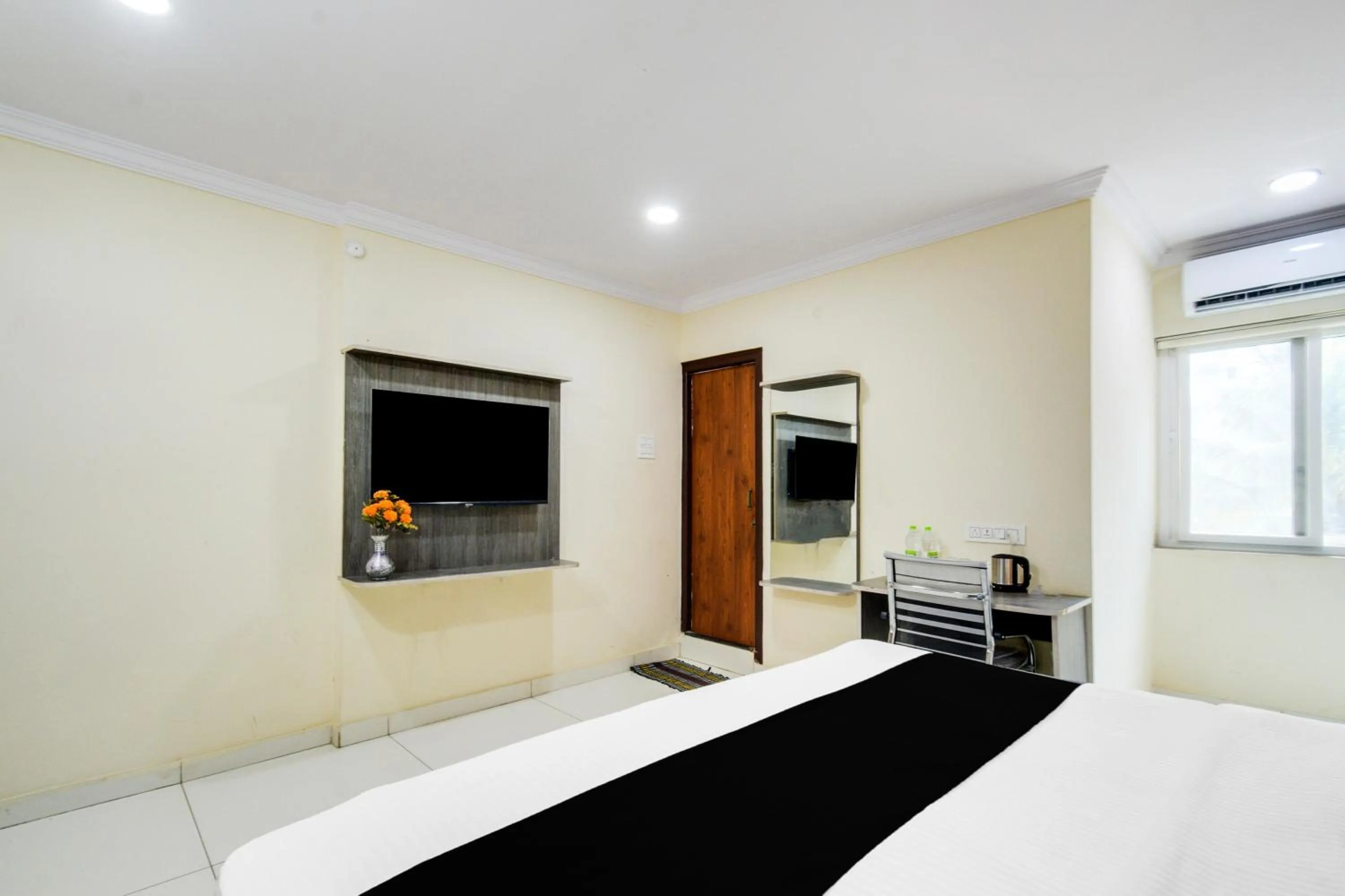 Bedroom, Bed in Super Townhouse Shamshabad Paradise Formerly Blue Petals Hotel