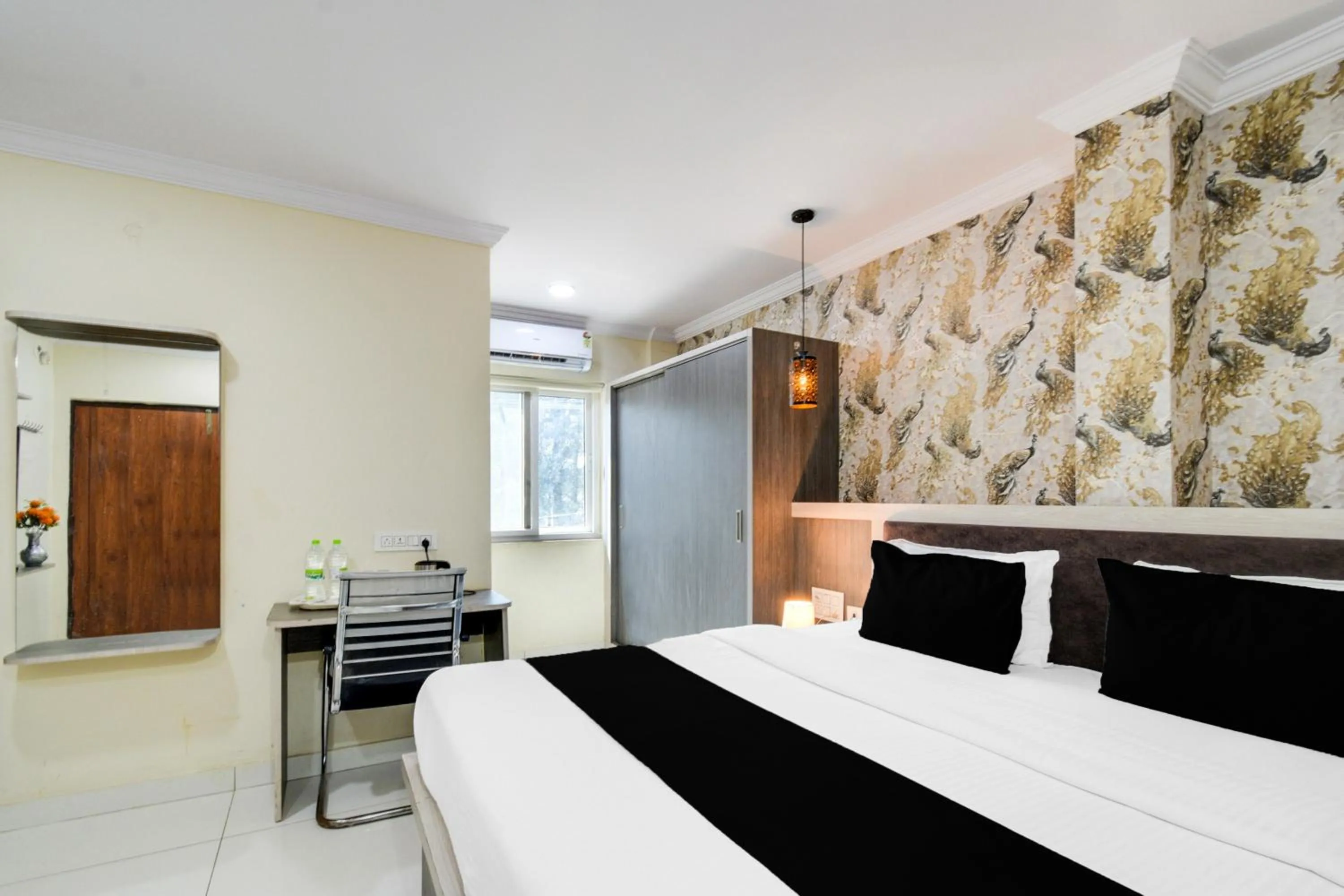 Bedroom, Bed in Super Townhouse Shamshabad Paradise Formerly Blue Petals Hotel