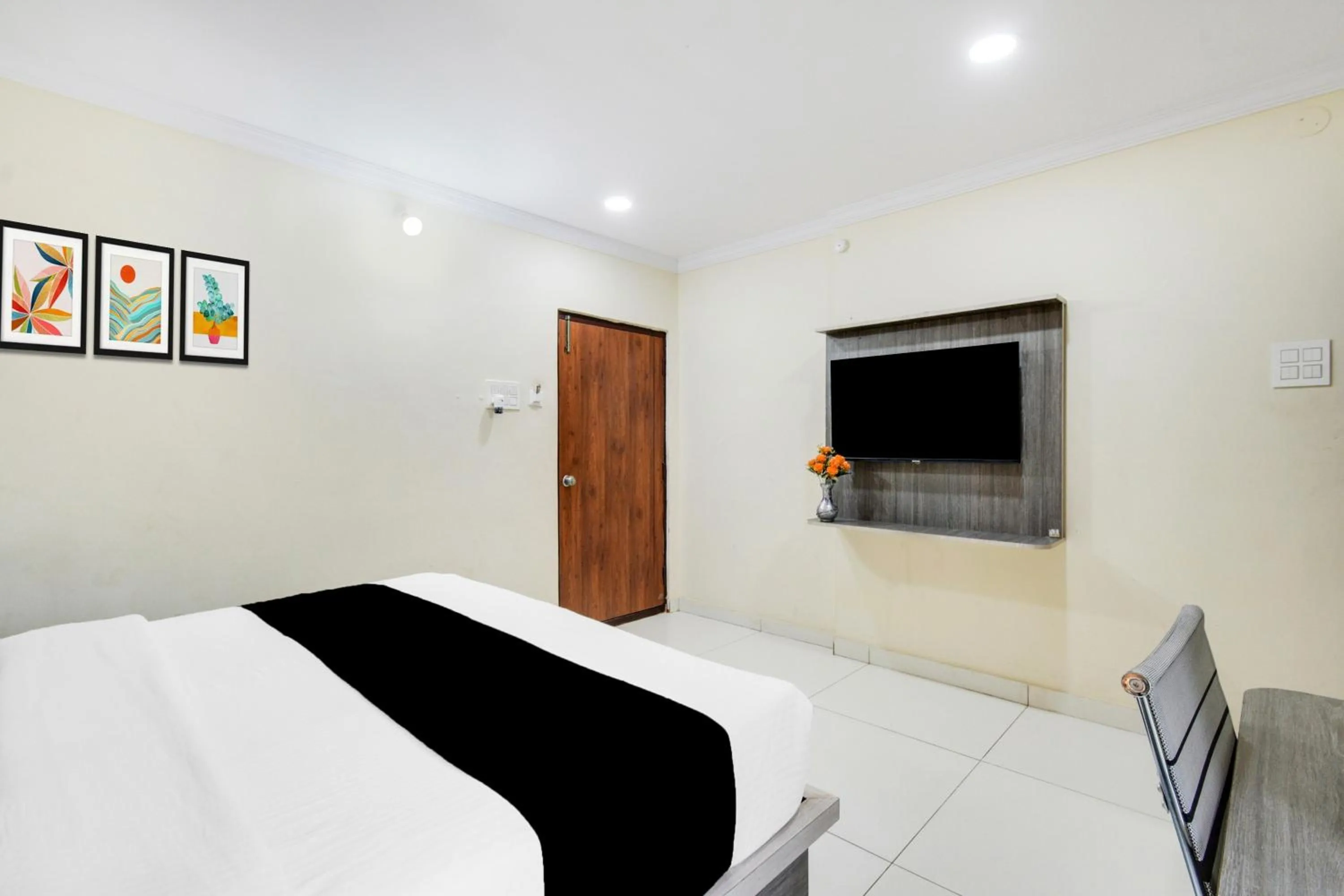 Bedroom, Bed in Super Townhouse Shamshabad Paradise Formerly Blue Petals Hotel