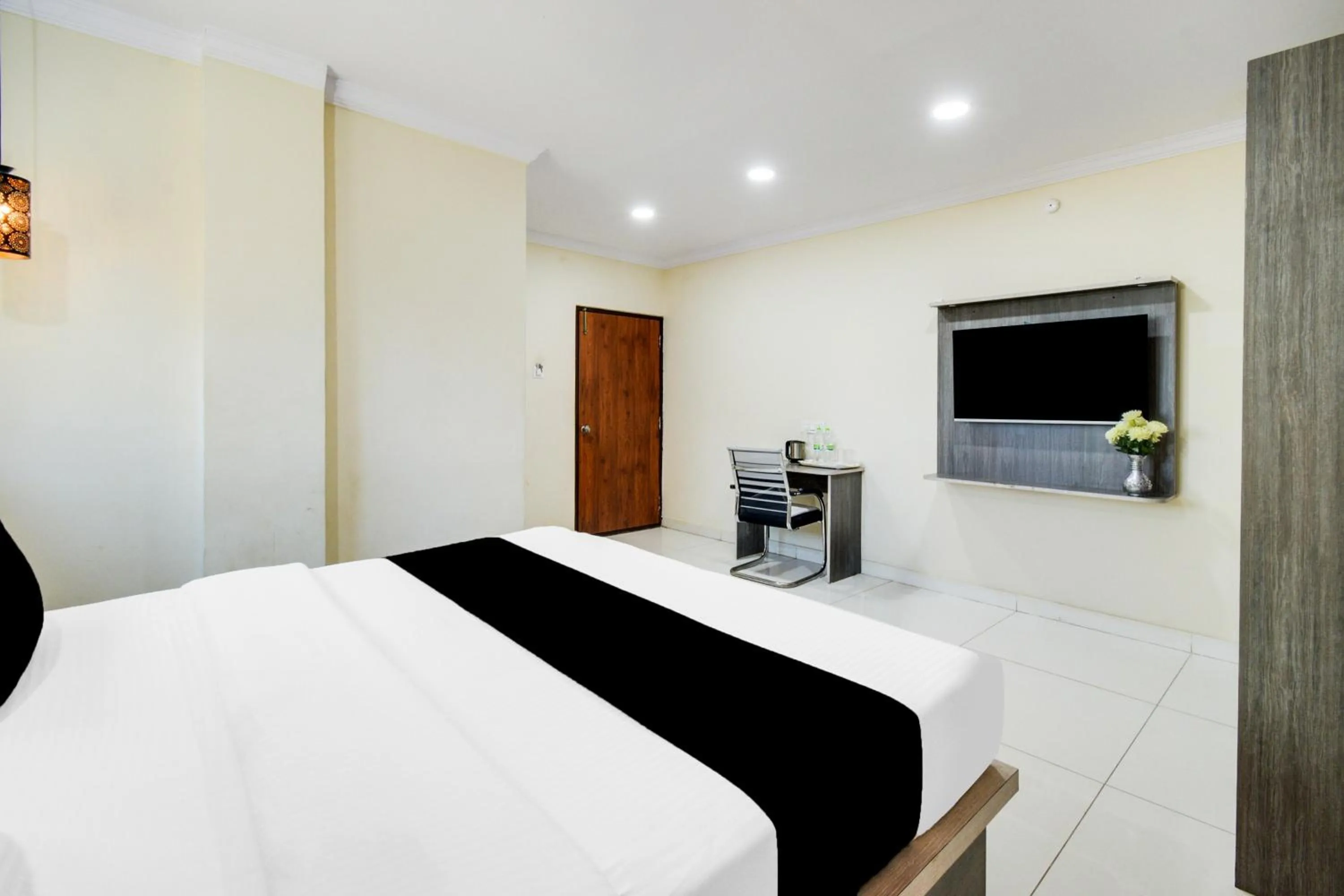 Bedroom, Bed in Super Townhouse Shamshabad Paradise Formerly Blue Petals Hotel