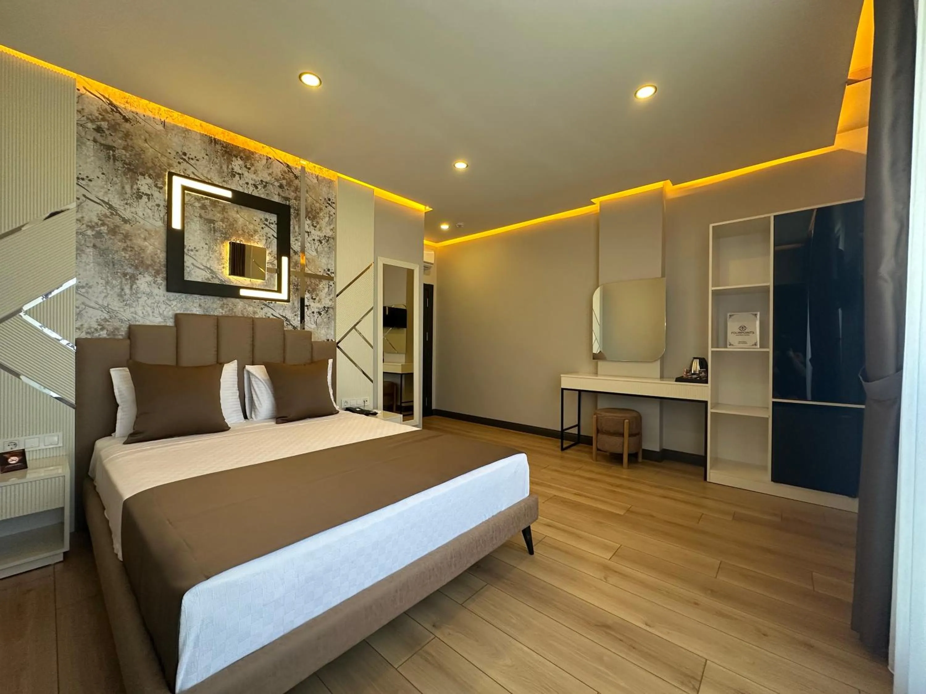 Photo of the whole room, Bed in Fourpoints Airport Hotel