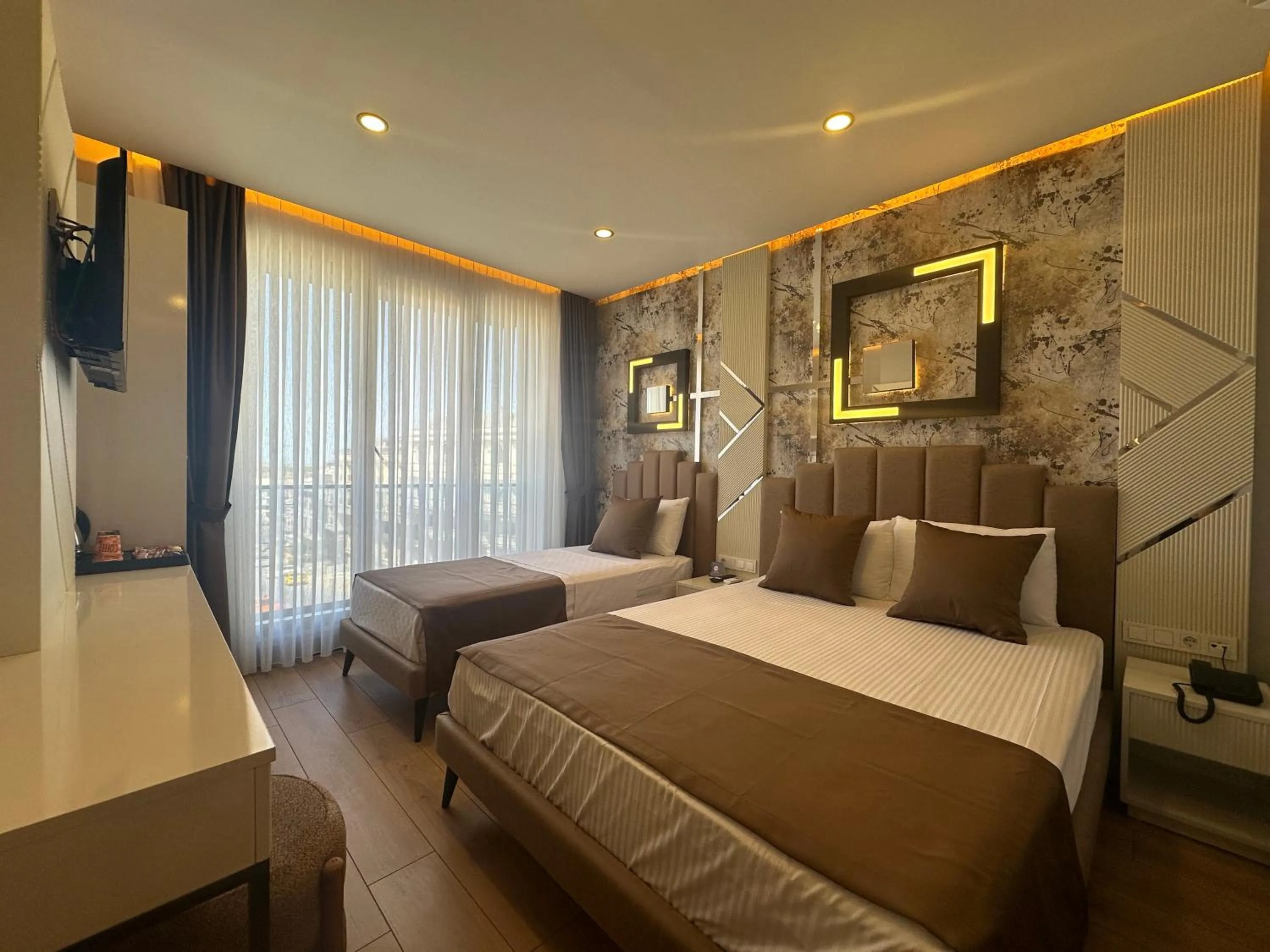 Photo of the whole room, Bed in Fourpoints Airport Hotel