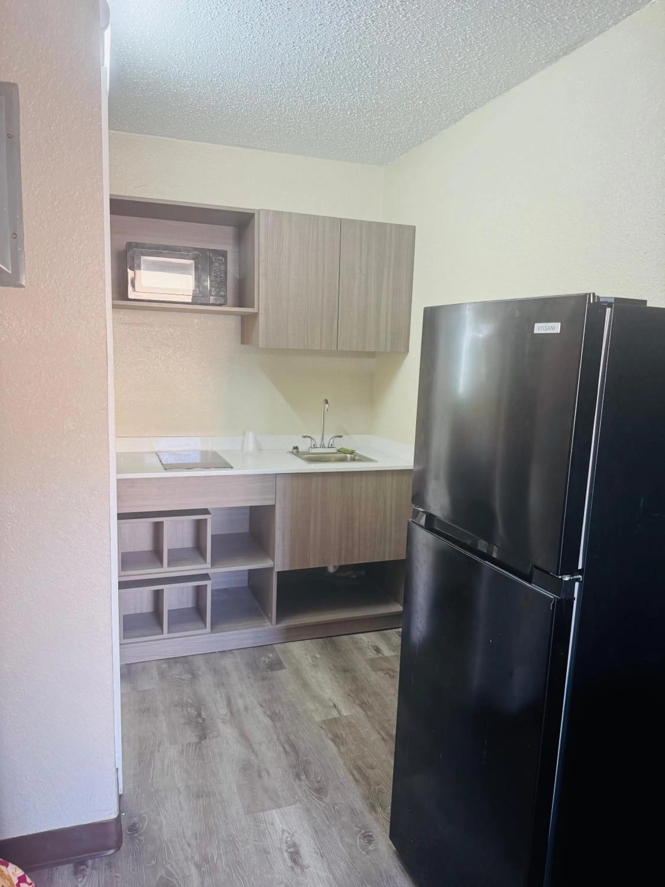 Kitchen or kitchenette in Studios & Suites 4 Less Virginia Beach