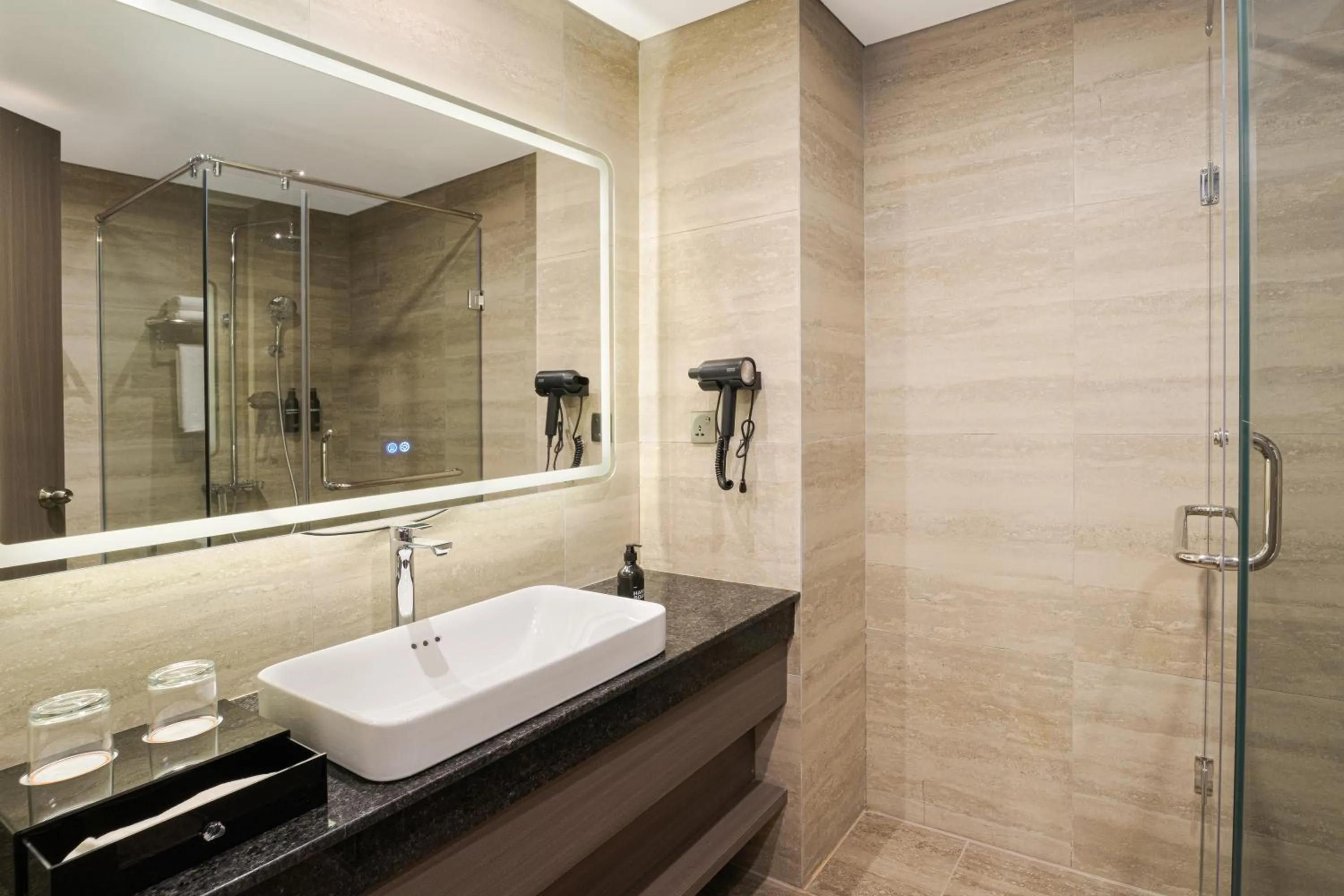 Bathroom in HARRIS Hotel & Suites Nagoya Batam