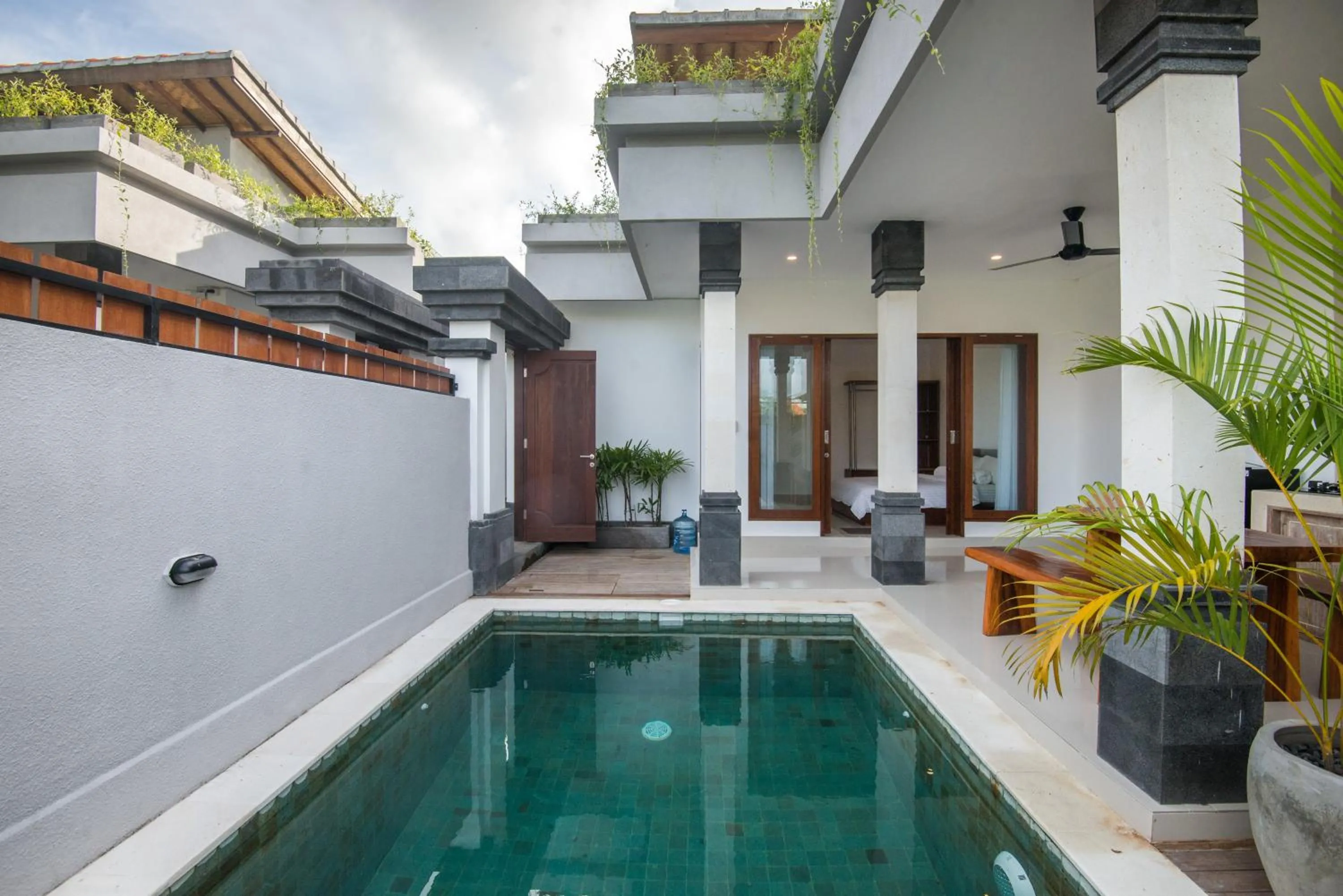 Swimming pool in Om Villas Kedungu