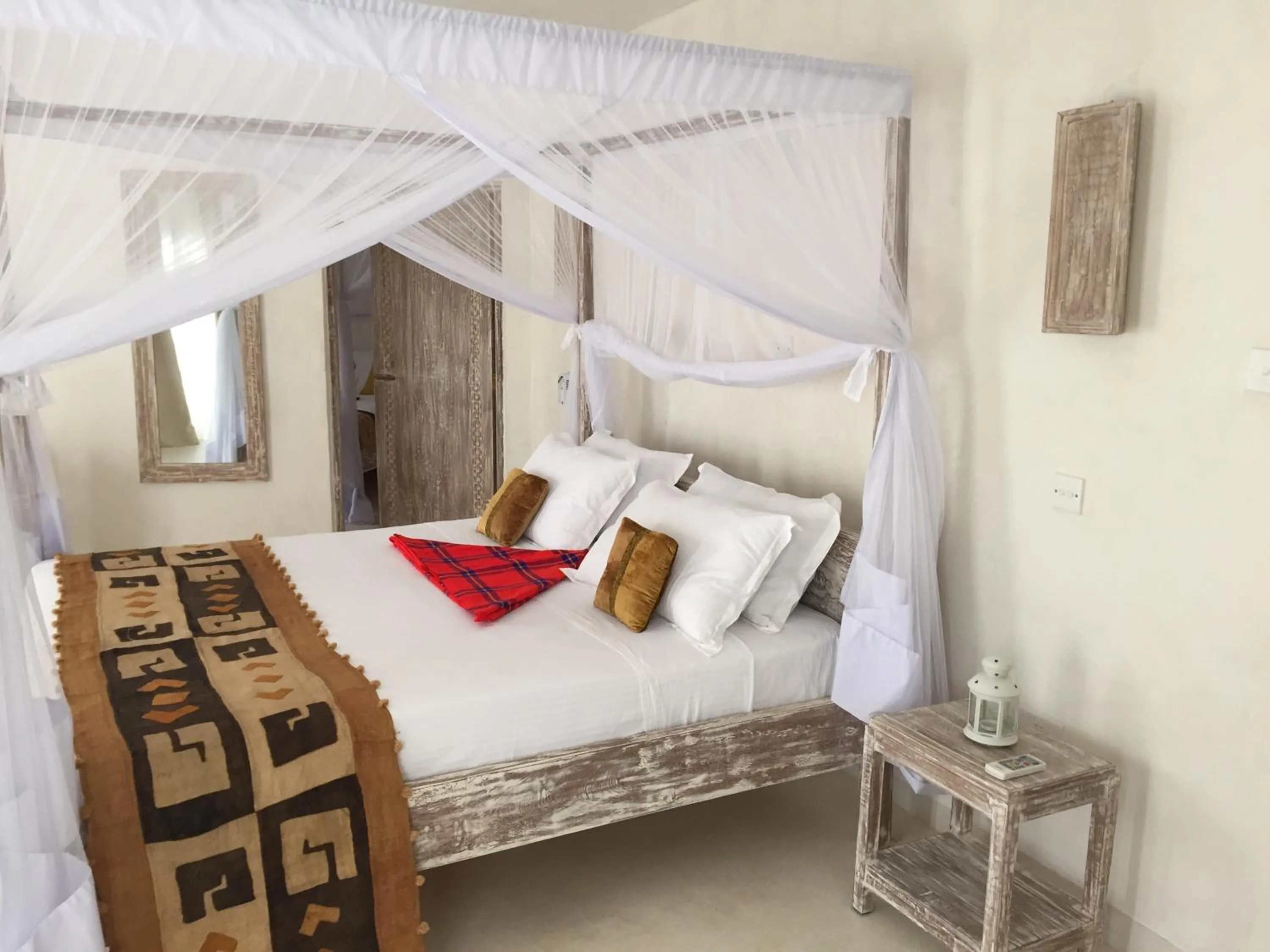 Bed in The Villa Luxury Suites Hotel