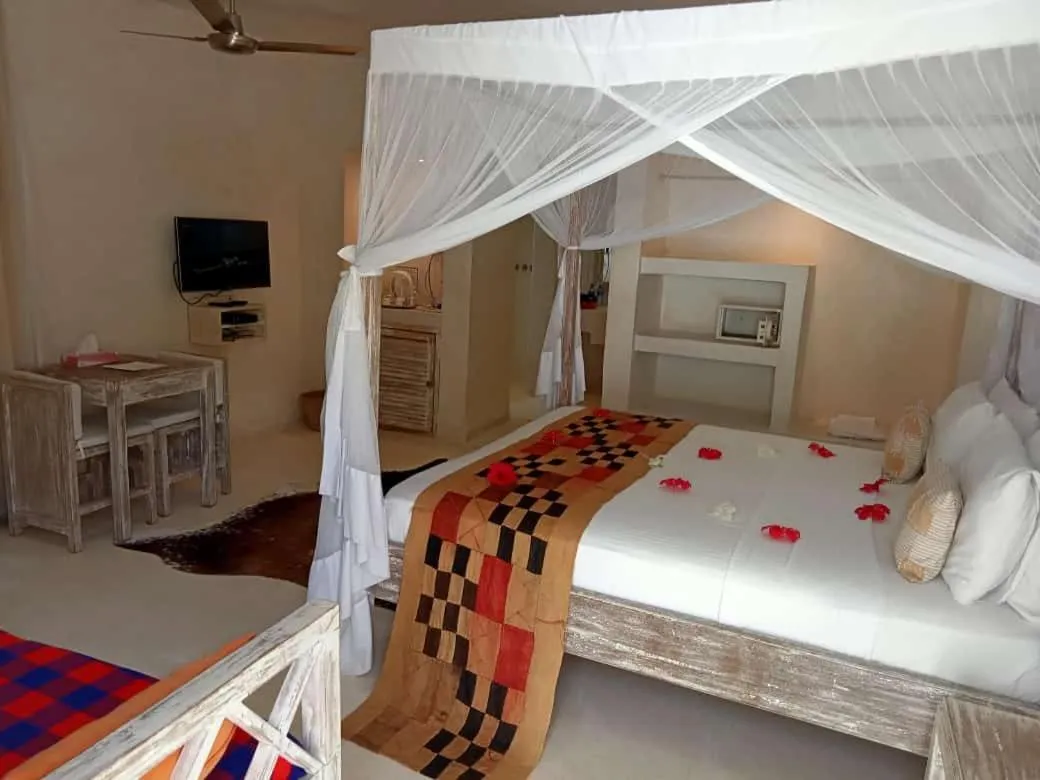 Bed in The Villa Luxury Suites Hotel