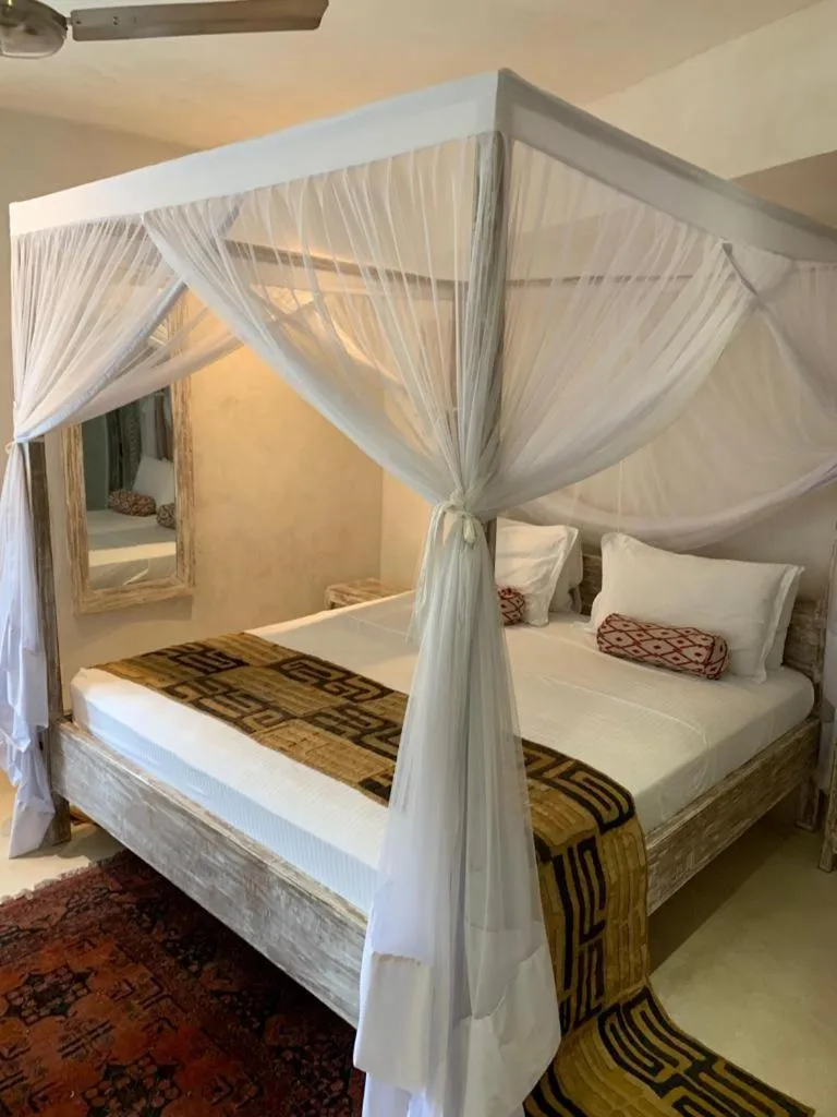 Bed in The Villa Luxury Suites Hotel