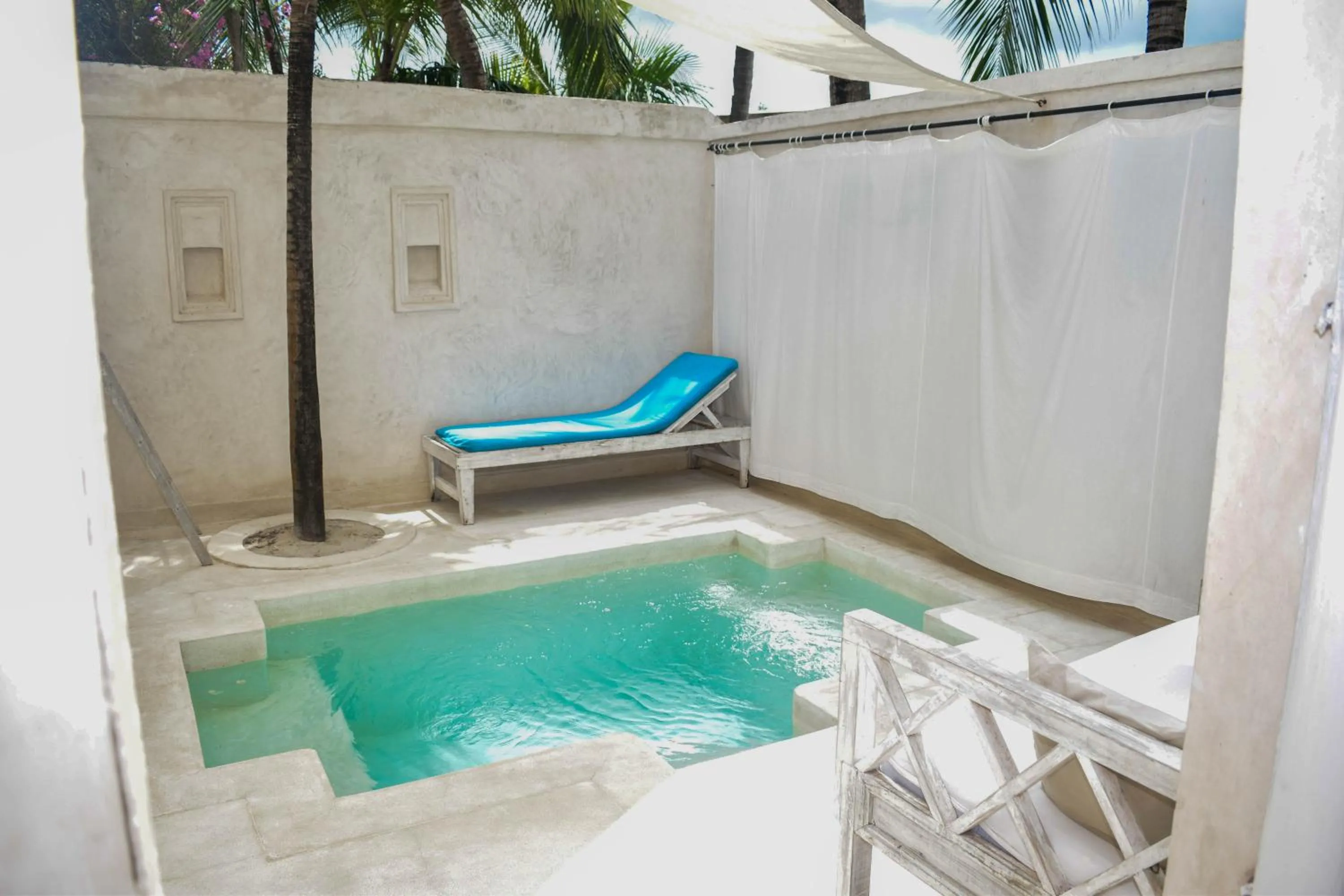 Swimming pool in The Villa Luxury Suites Hotel
