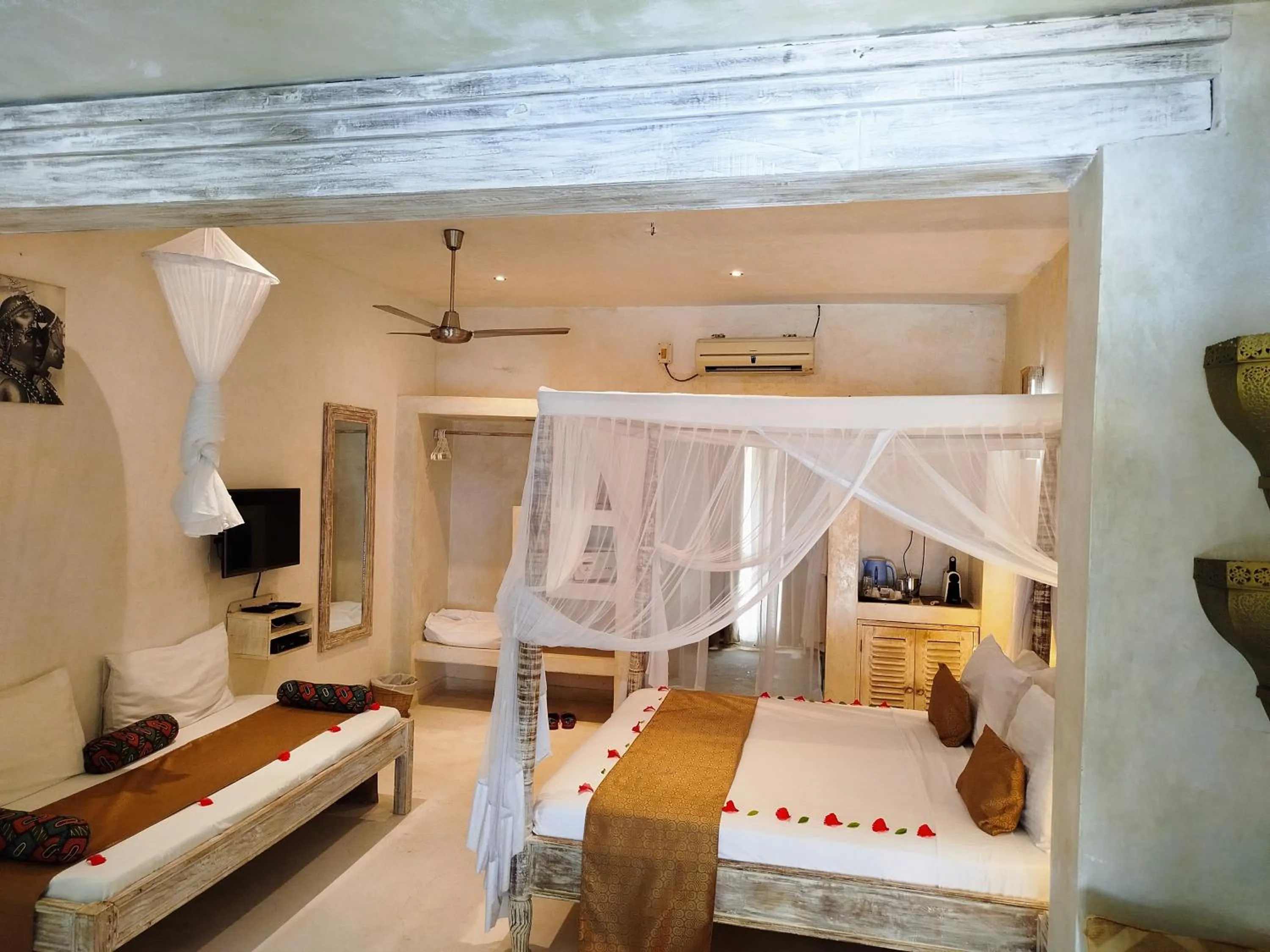 Bed in The Villa Luxury Suites Hotel