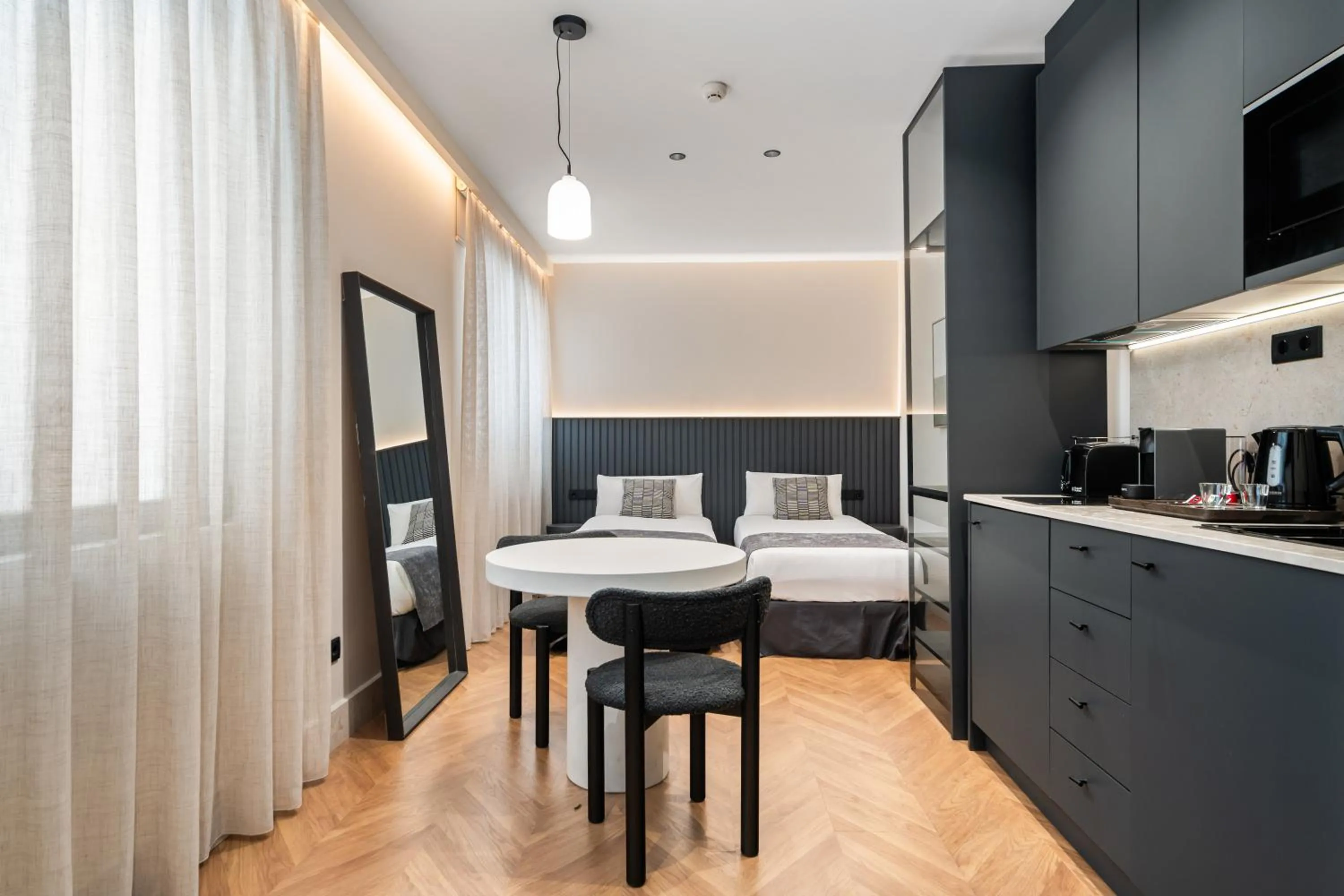 Bed in Pacifico Suites near Retiro