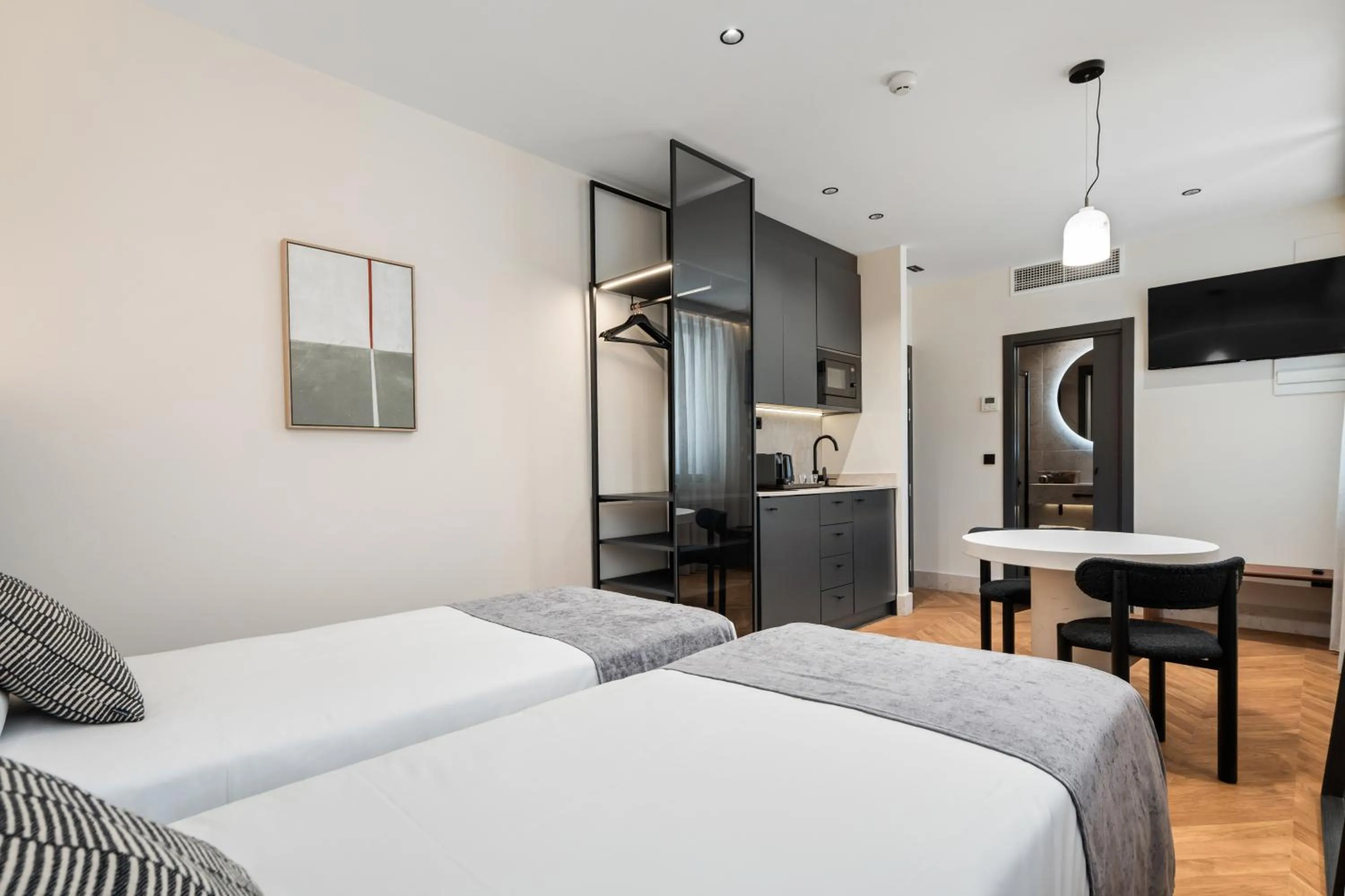 Bed in Pacifico Suites near Retiro