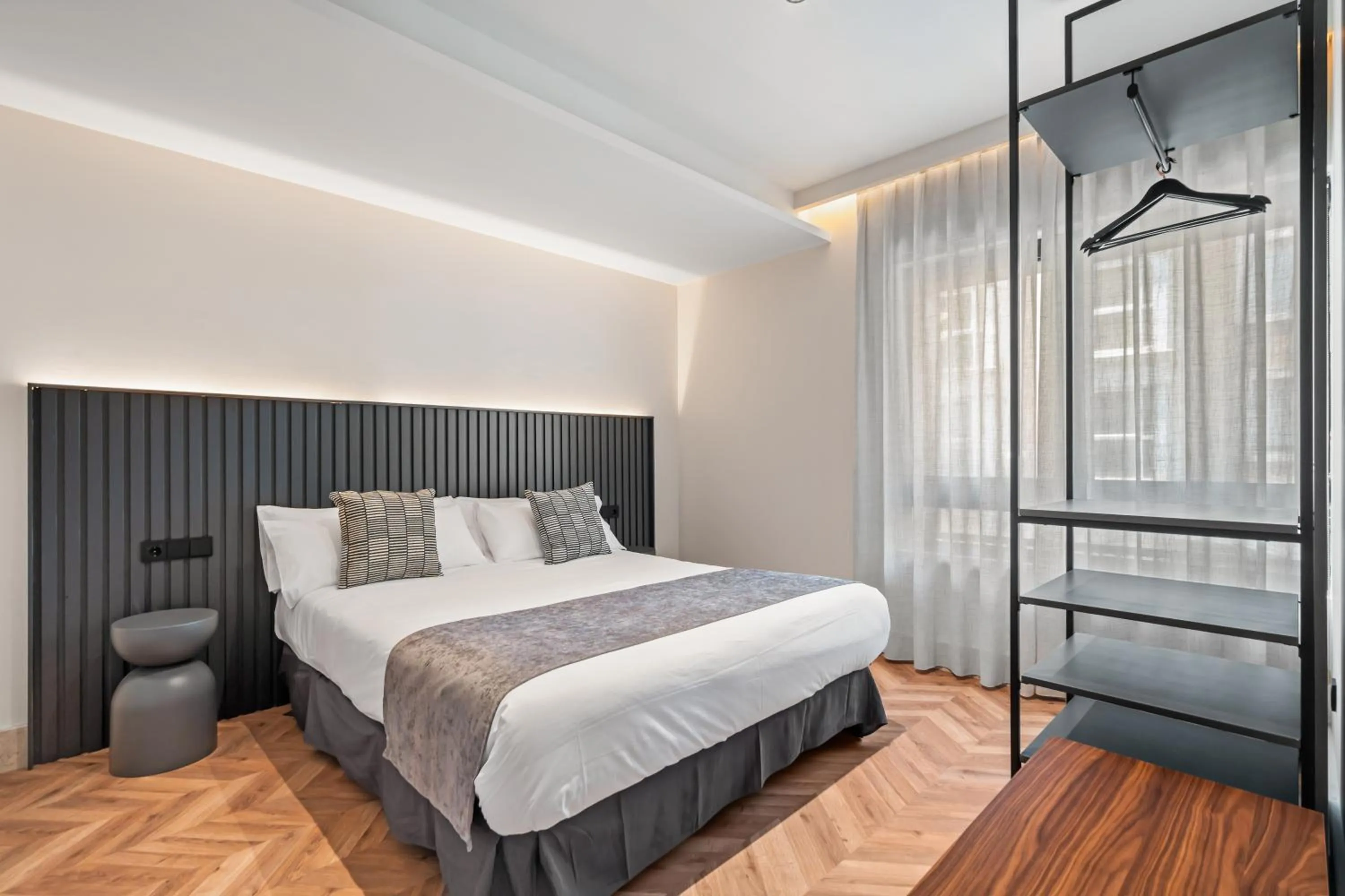 Bed in Pacifico Suites near Retiro