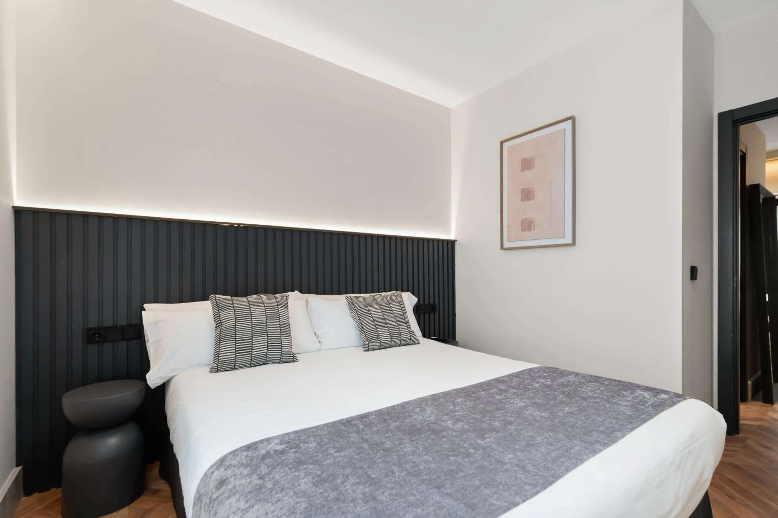 Bed in Pacifico Suites near Retiro