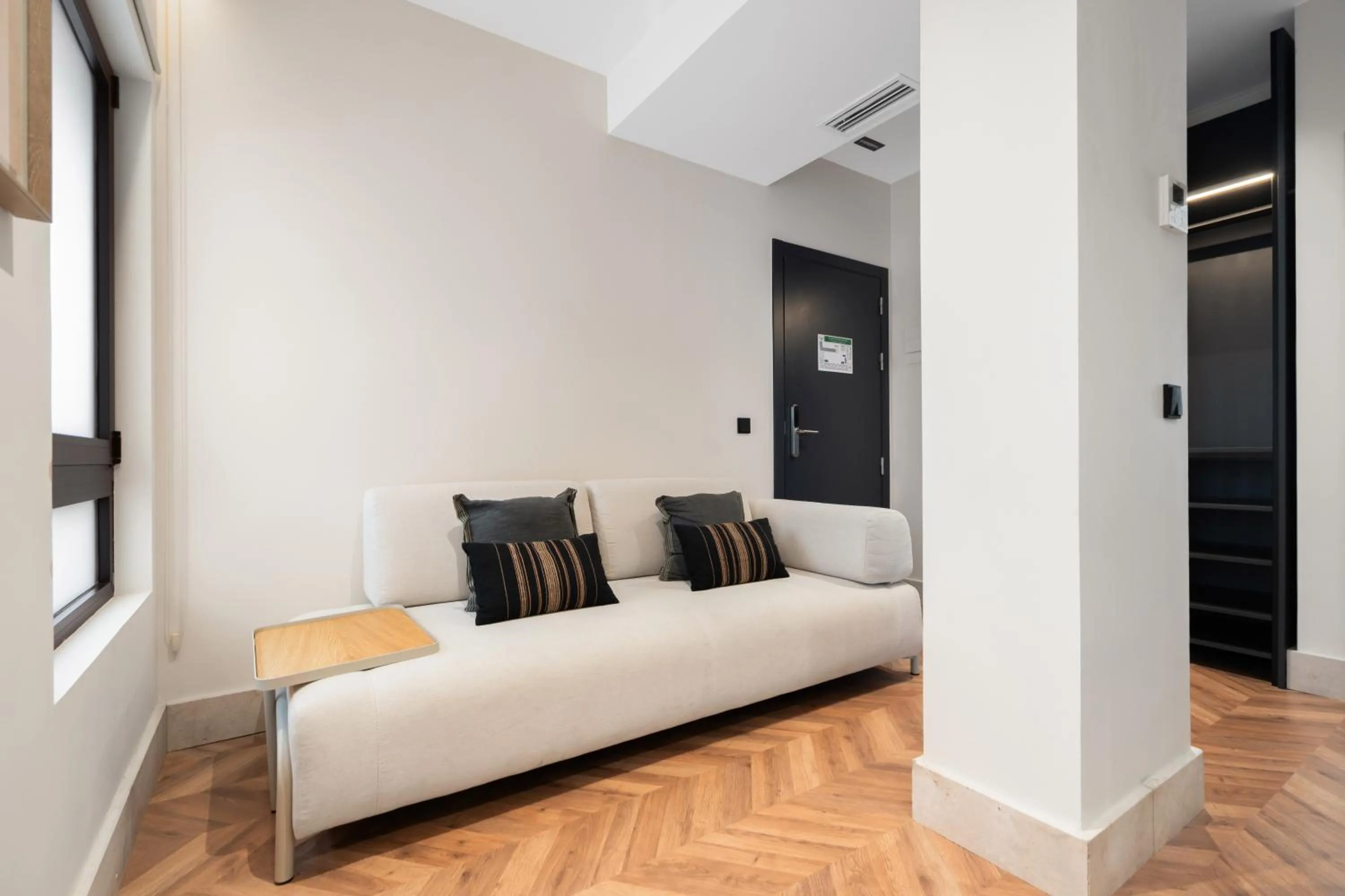 Bed in Pacifico Suites near Retiro