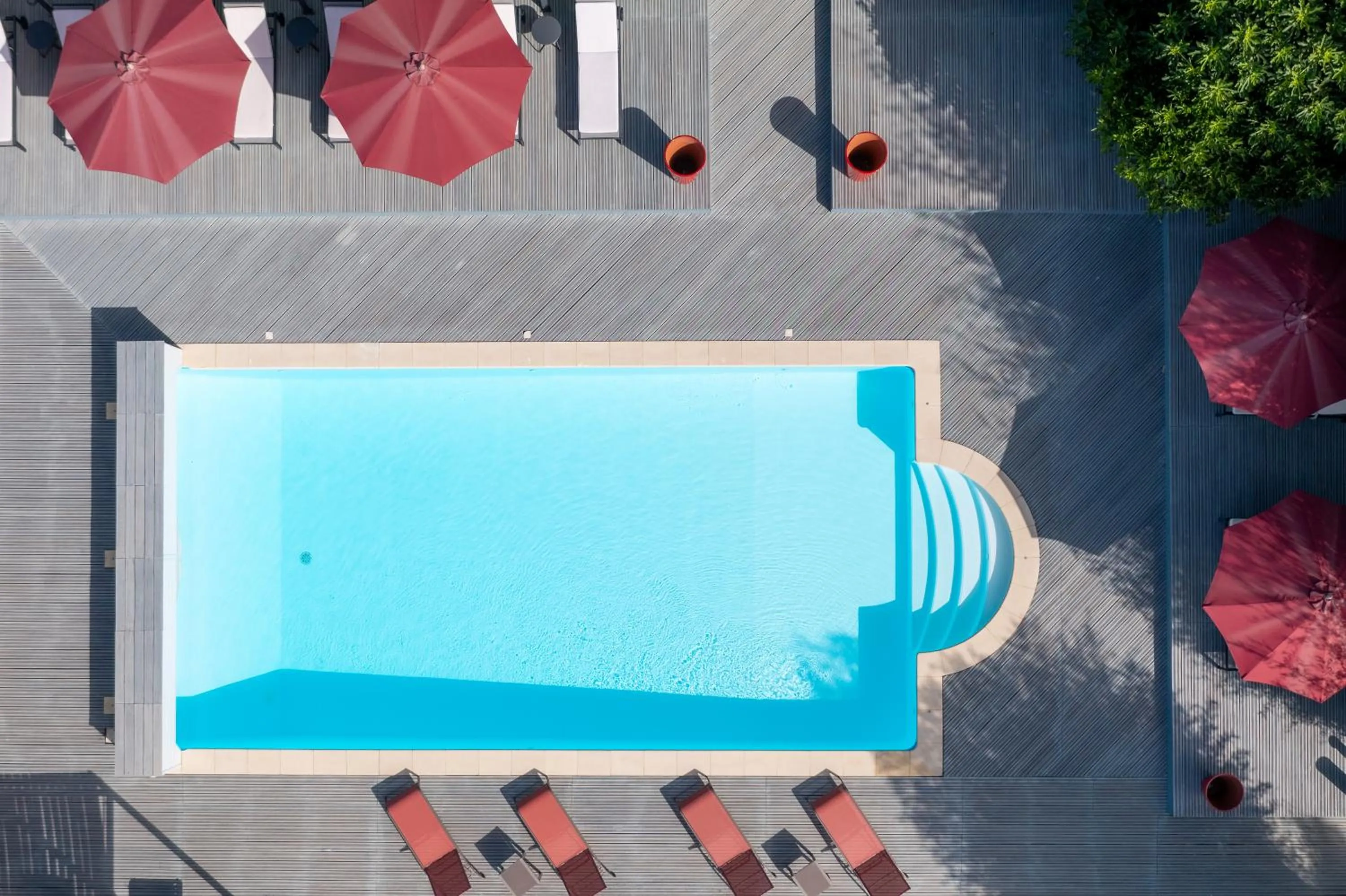 Pool view in La Cour Des Sens