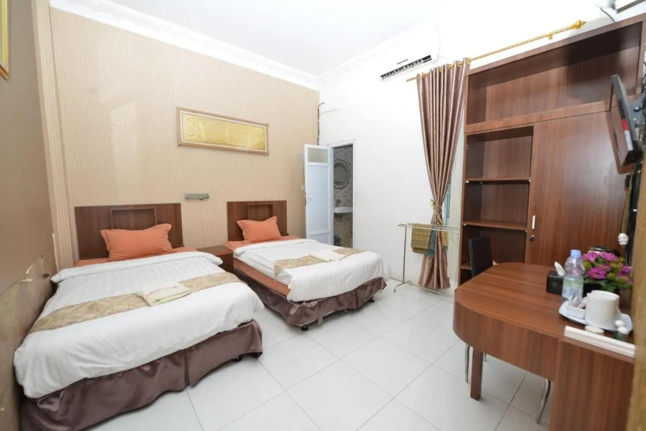 Bed in Hotel Alifa Syariah