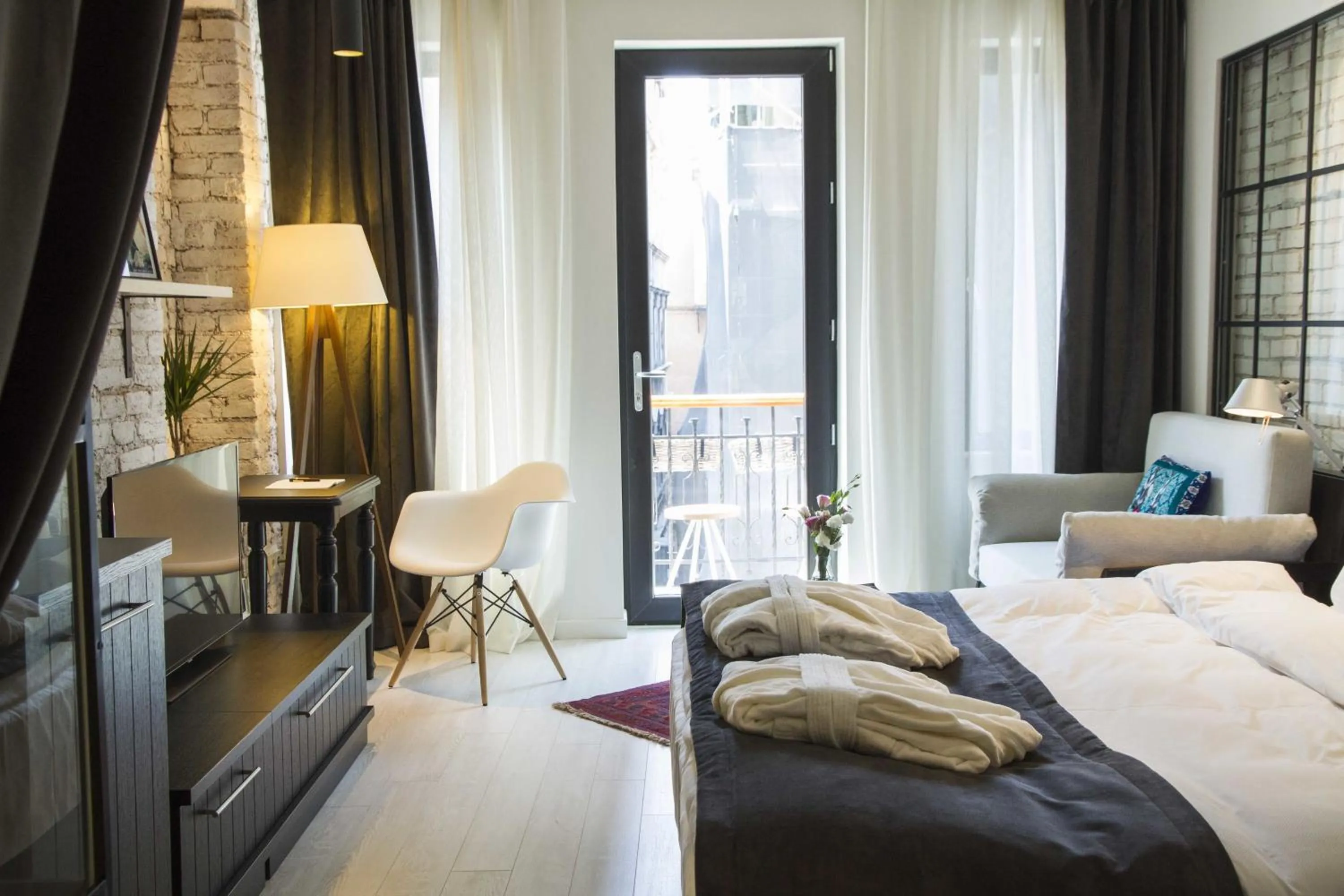 Photo of the whole room, Bed in Magnova Studios