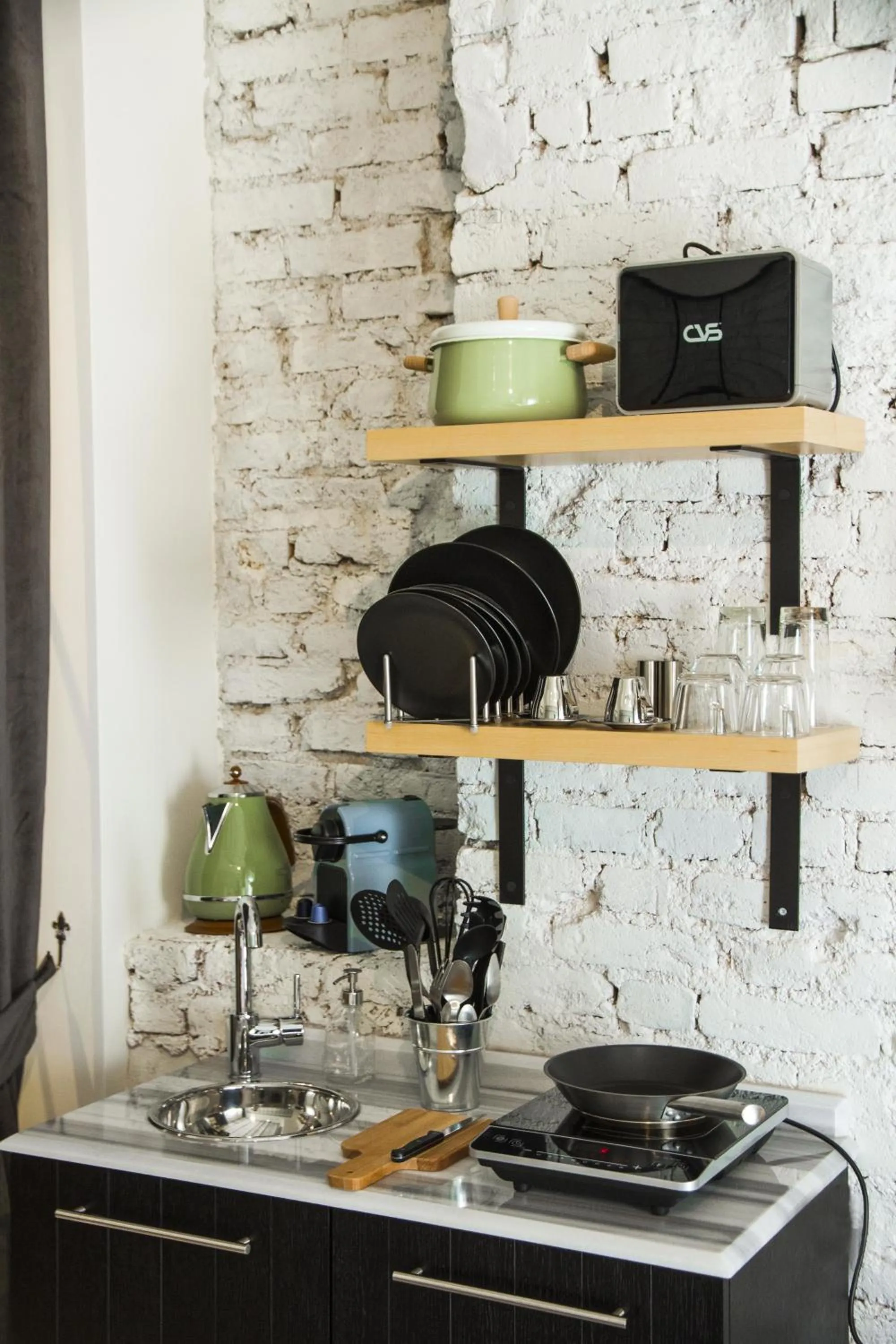 Kitchen or kitchenette in Magnova Studios