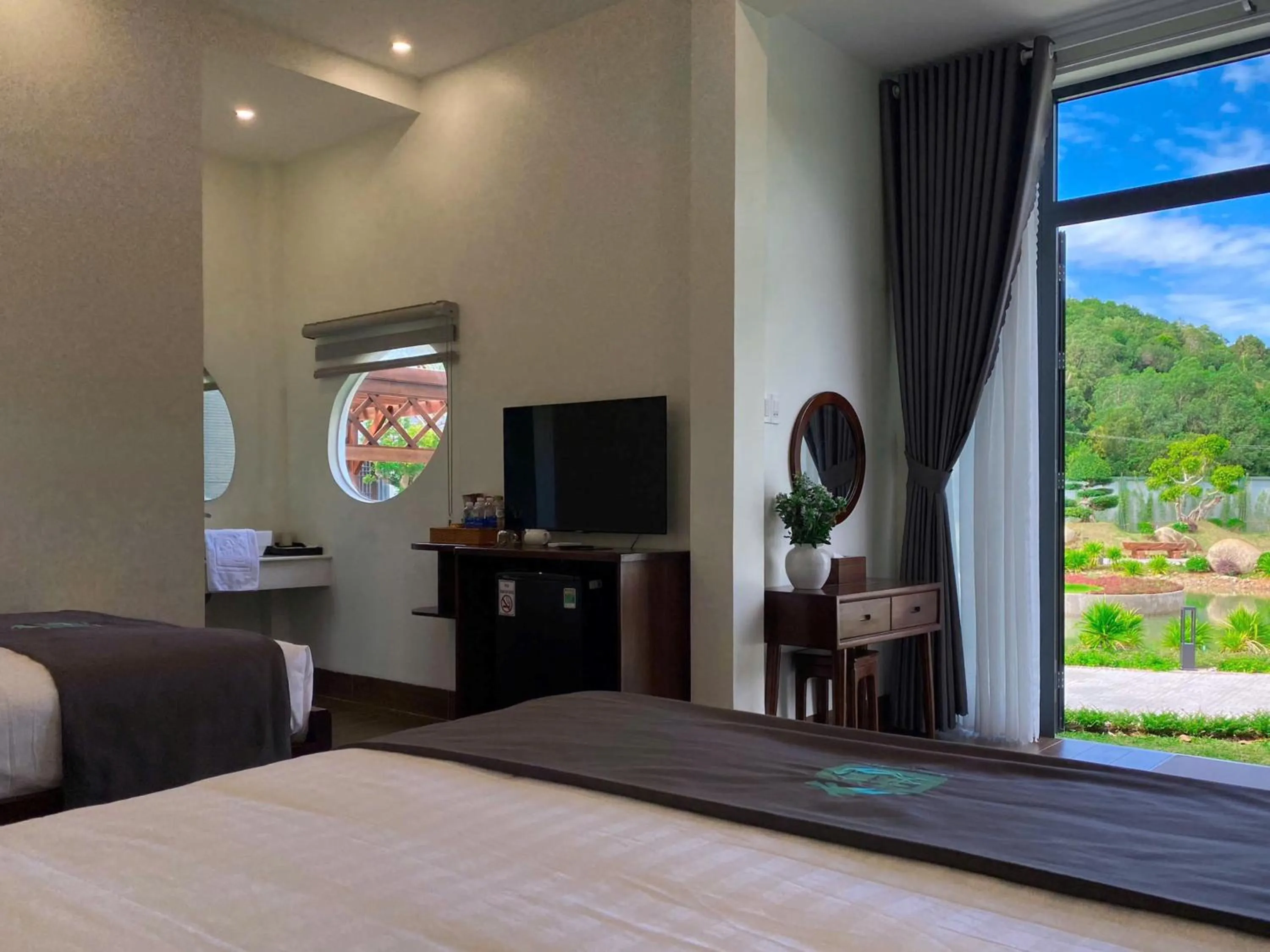 Bed in Homestay Hà Tiên Dragon