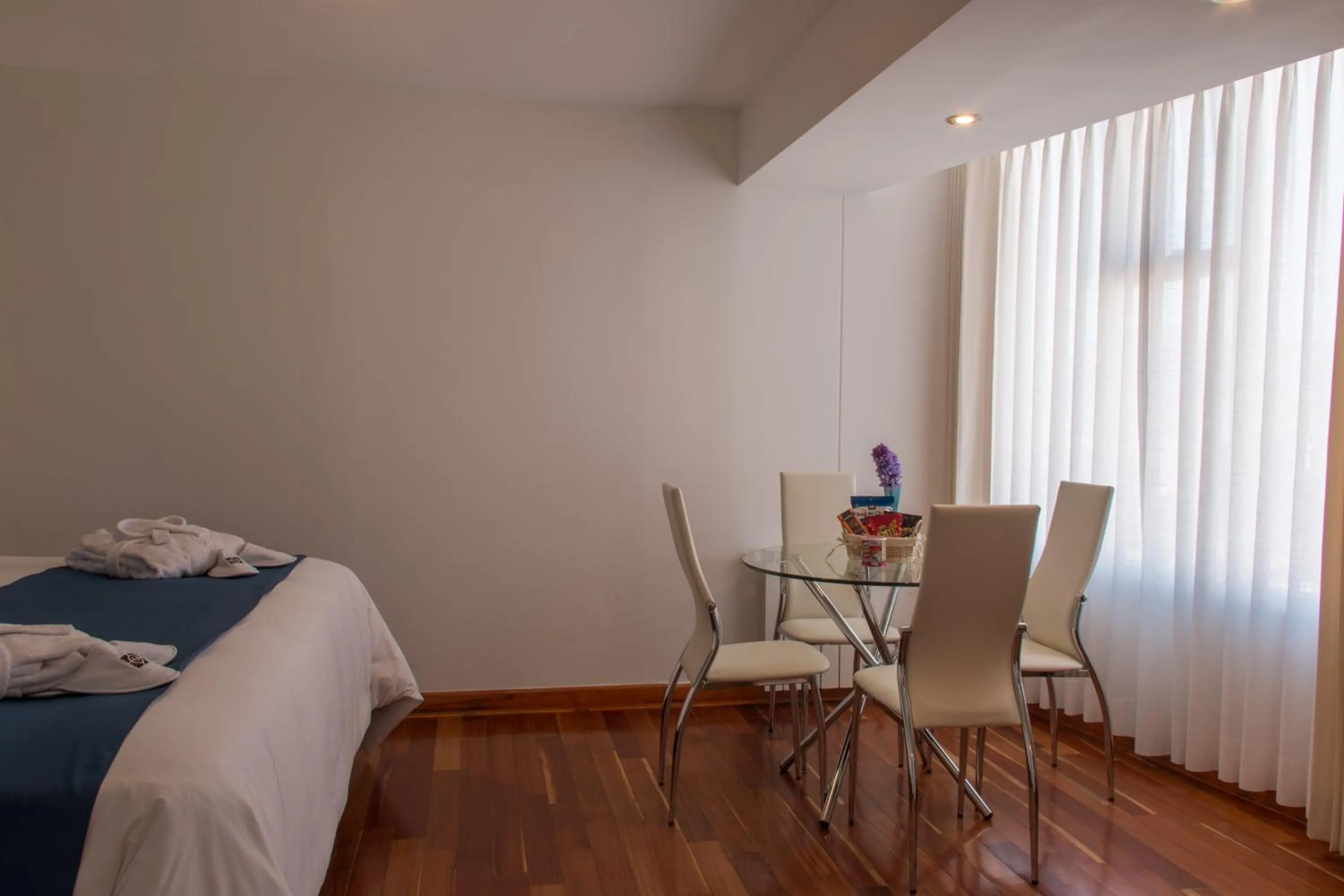 Living room, Bed in Wayqey Hotel