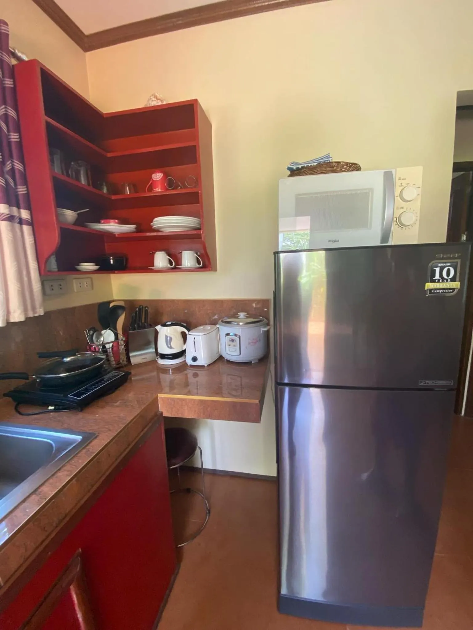 Kitchen or kitchenette in Siargao Sunset Bay Beach Villas